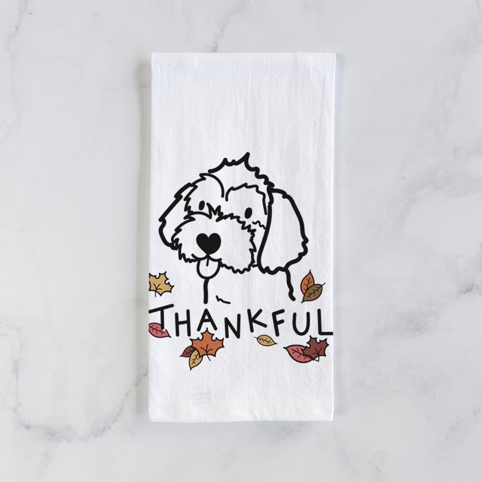 Minimalist line drawing of a Havapoo with 'Thankful' lettering on a tea towel