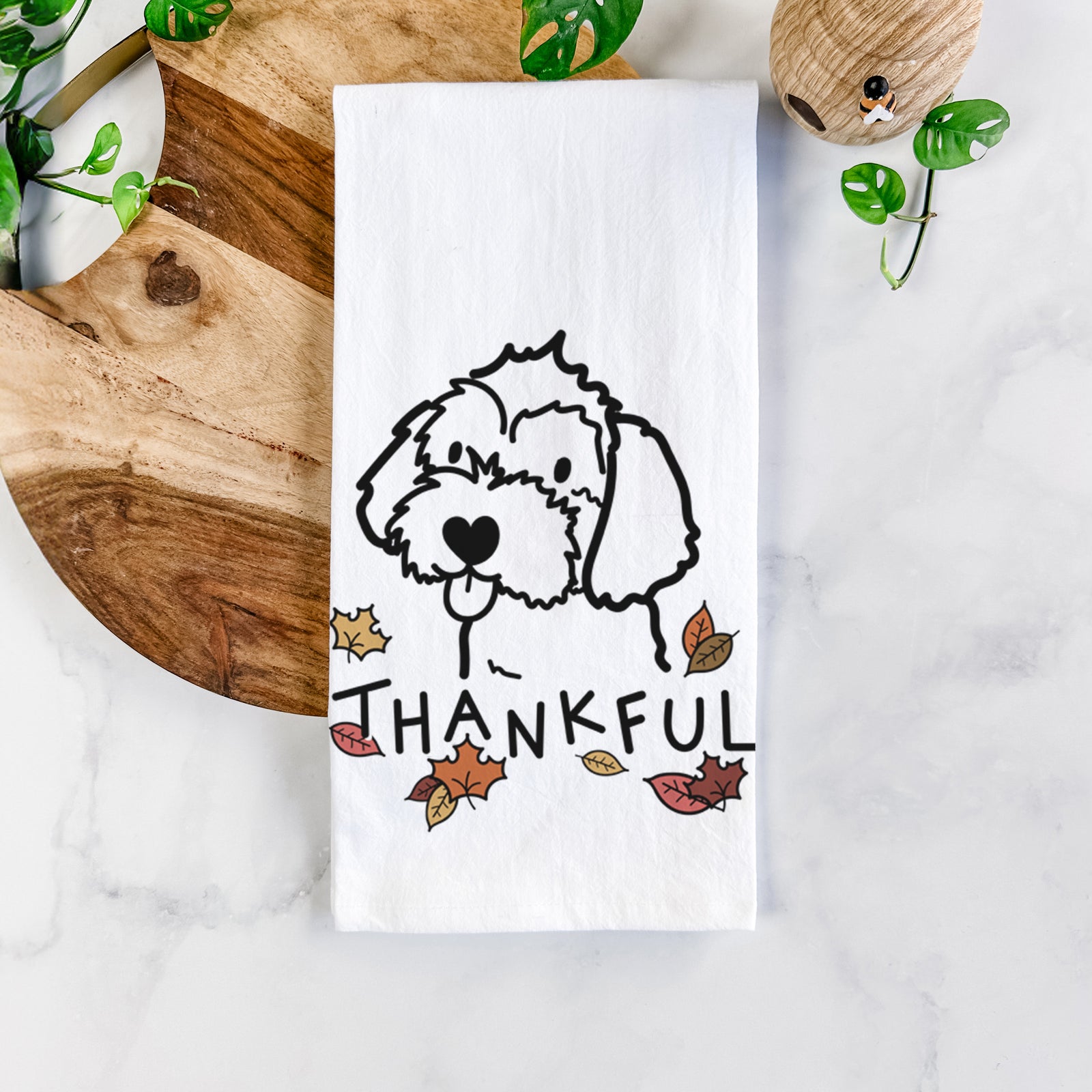 Minimalist line drawing of a Havapoo with 'Thankful' lettering on a tea towel