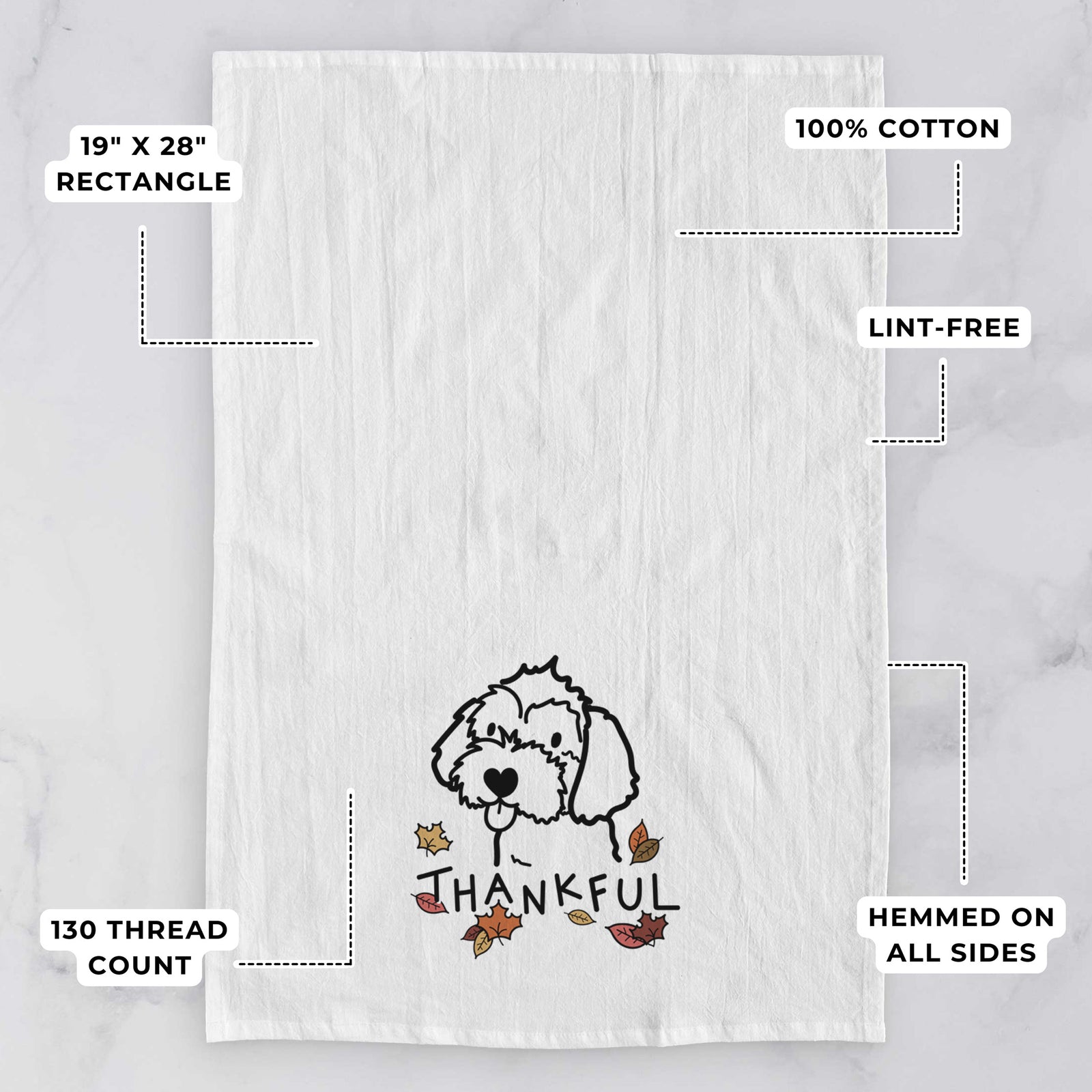 Minimalist line drawing of a Havapoo with 'Thankful' lettering on a tea towel, with feature callouts: 19 x 28 inch rectangle, 100% cotton, lint-free, 120 thread count, hemmed on all sides