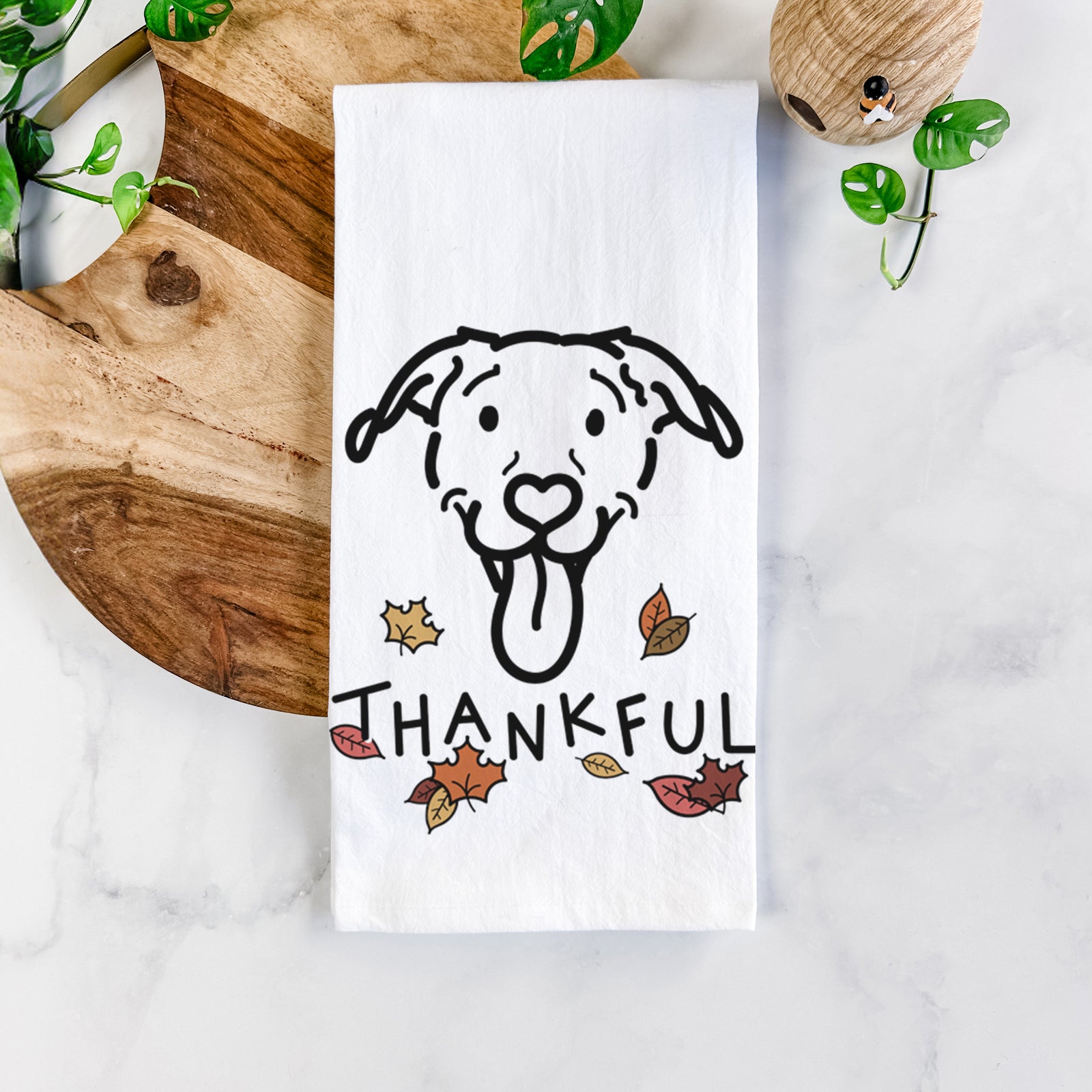 Minimalist line drawing of Hemi the Pitbull Mix with 'Thankful' lettering on a tea towel