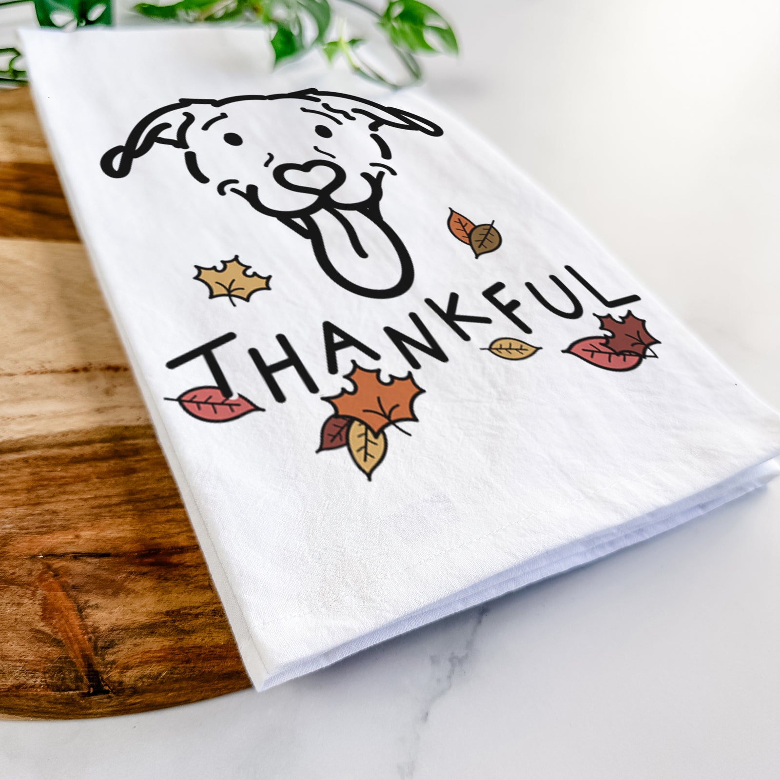 Minimalist line drawing of Hemi the Pitbull Mix with 'Thankful' lettering on a tea towel