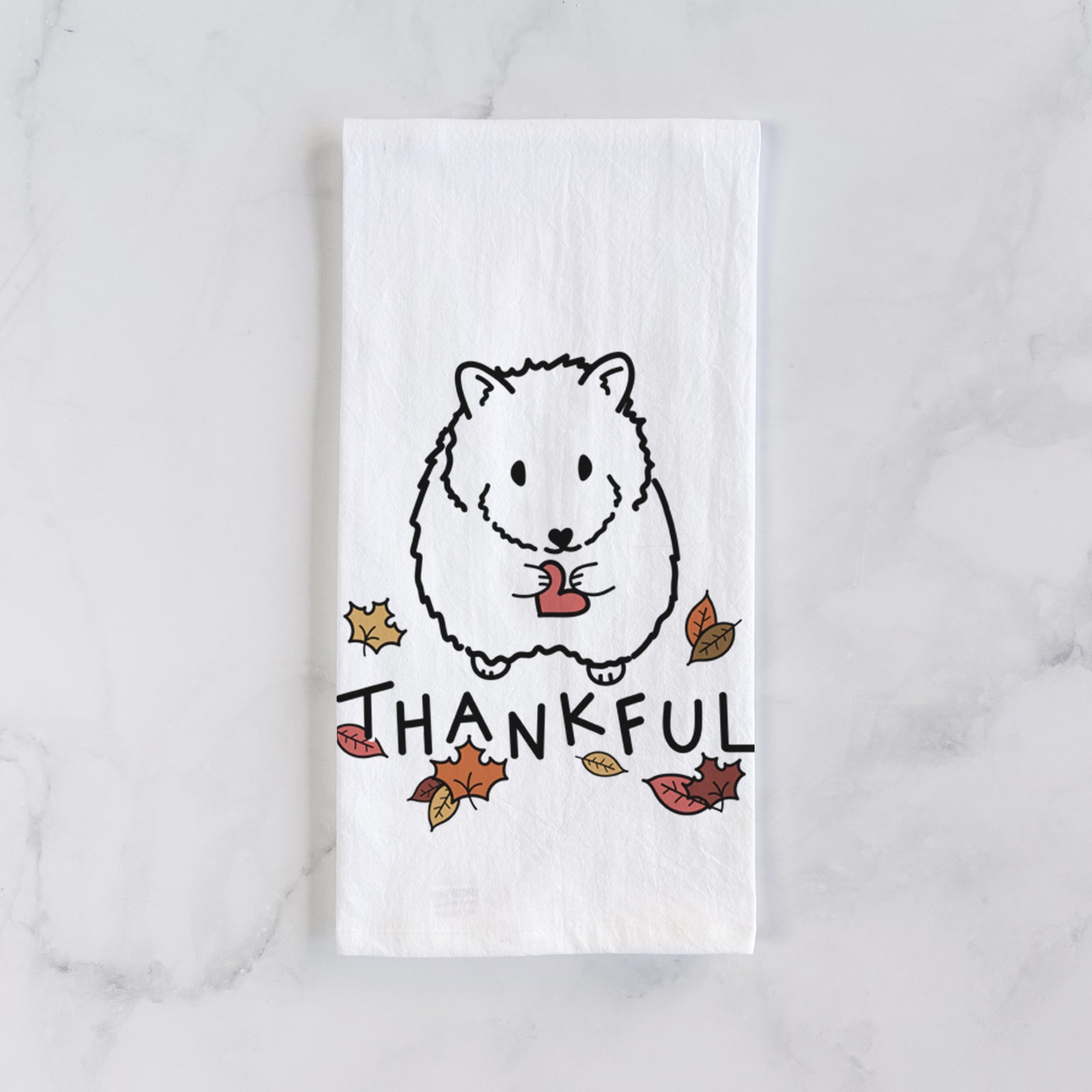 Minimalist line drawing of Hilga the Hamster with 'Thankful' lettering on a tea towel