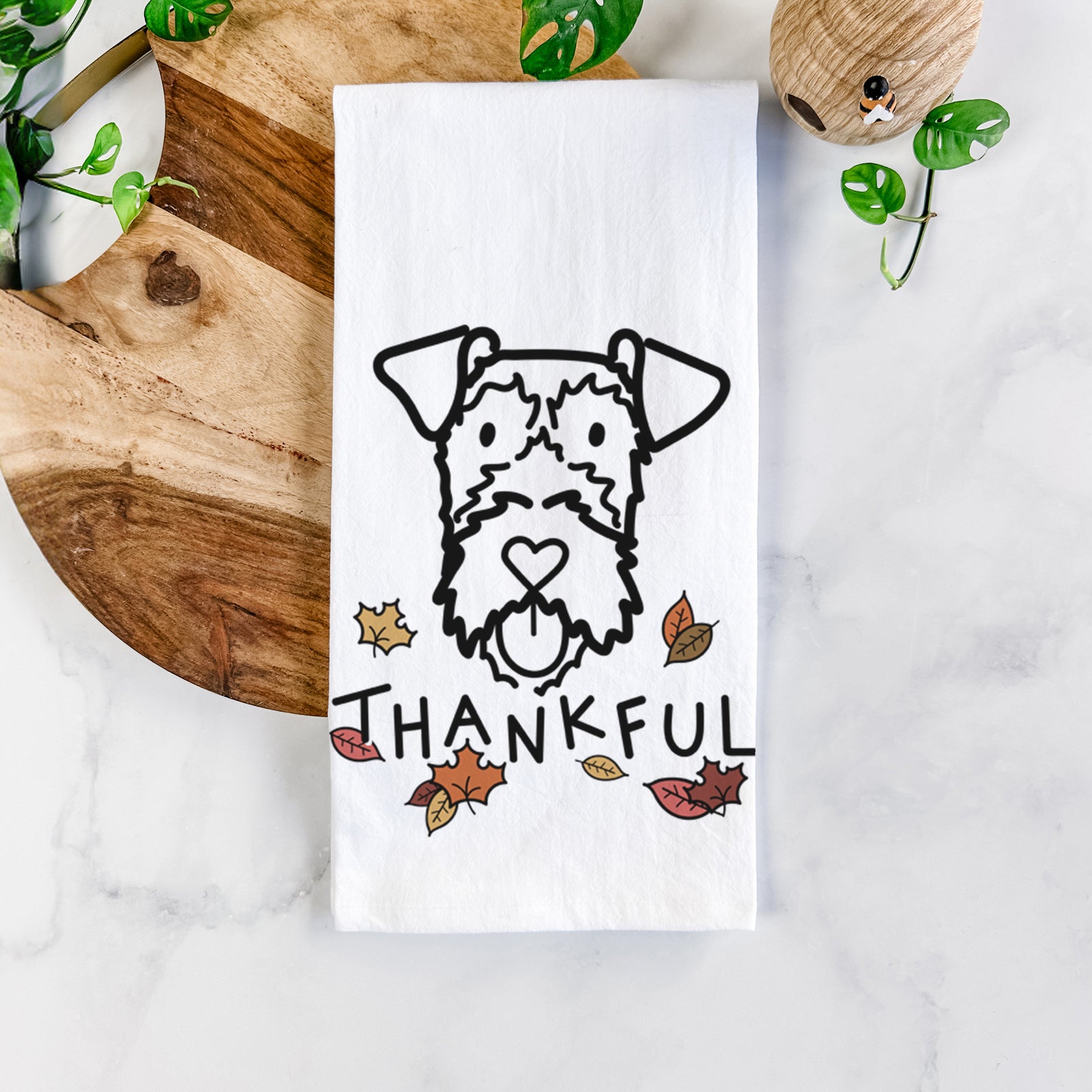 Minimalist line drawing of an Irish Terrier with 'Thankful' lettering on a tea towel