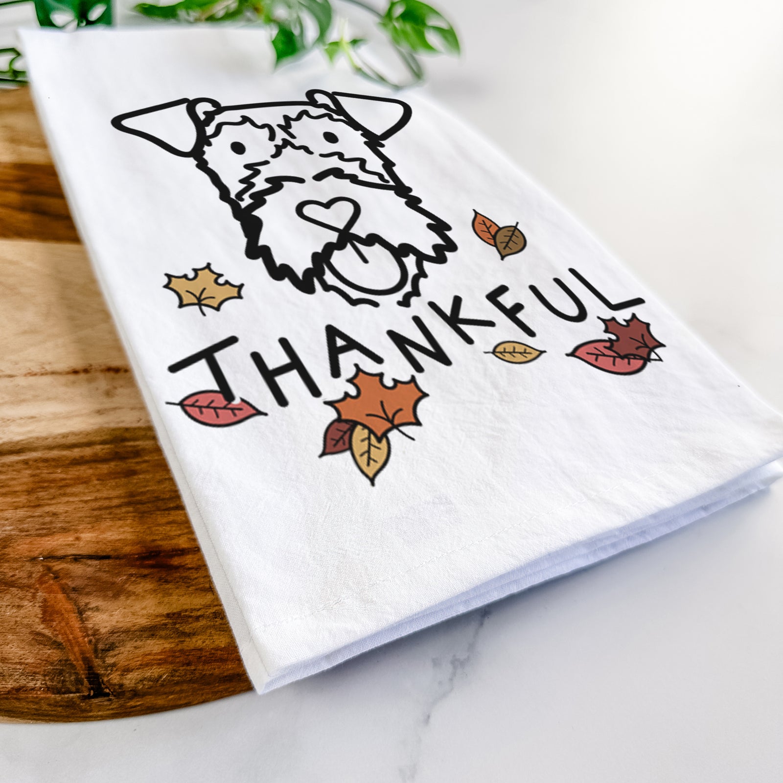 Minimalist line drawing of an Irish Terrier with 'Thankful' lettering on a tea towel