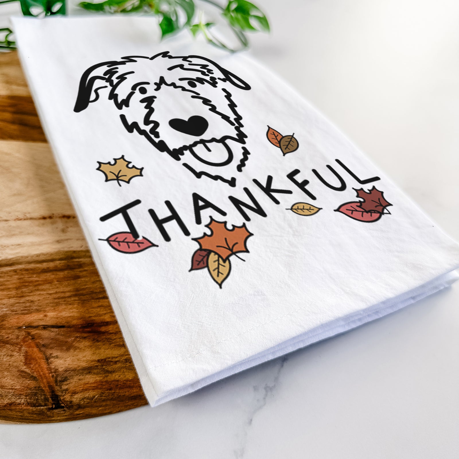 Minimalist line drawing of an Irish Wolfhound with 'Thankful' lettering on a tea towel