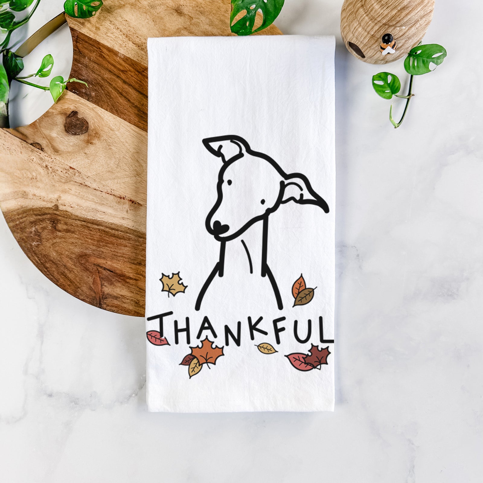Minimalist line drawing of an Italian Greyhound with 'Thankful' lettering on a tea towel
