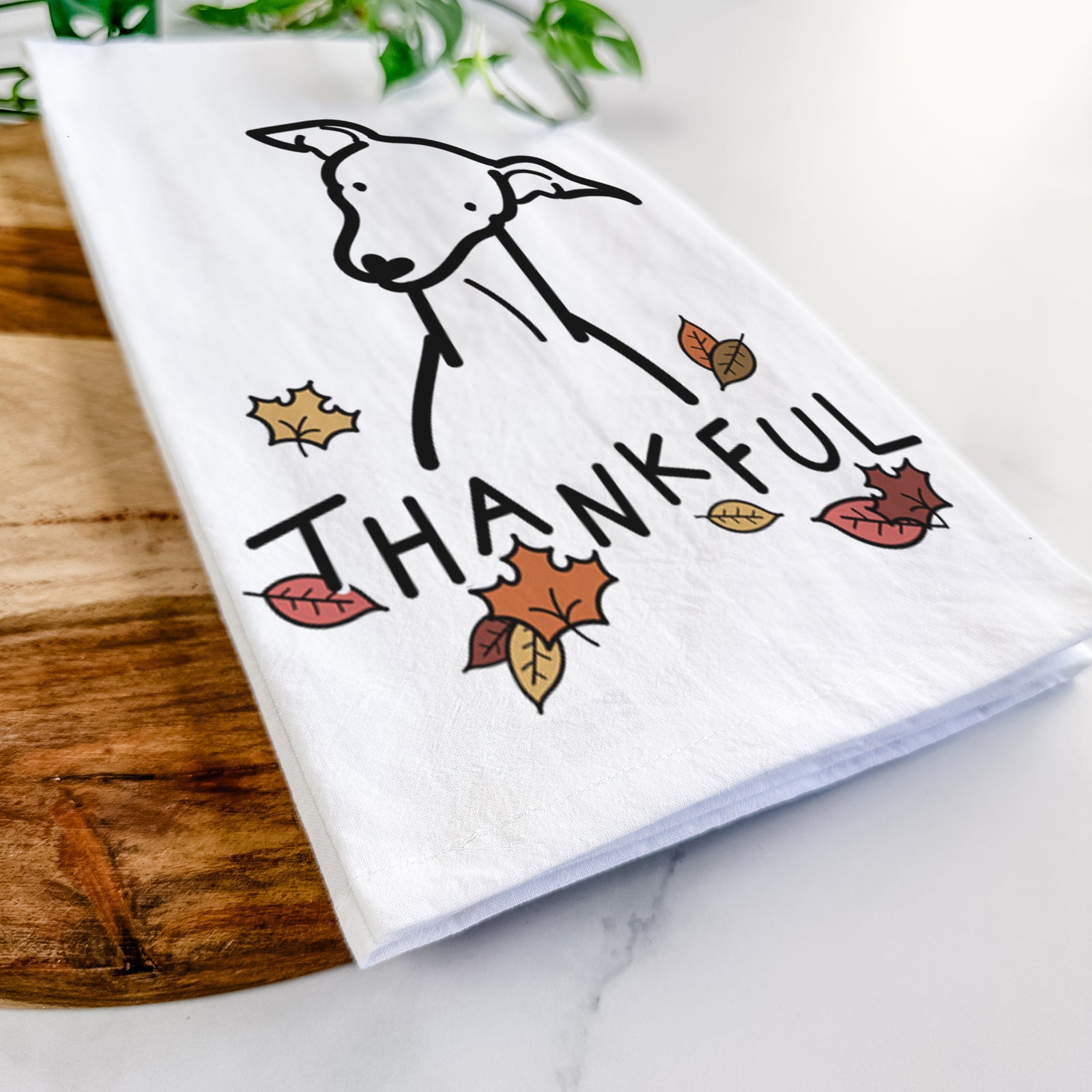Minimalist line drawing of an Italian Greyhound with 'Thankful' lettering on a tea towel