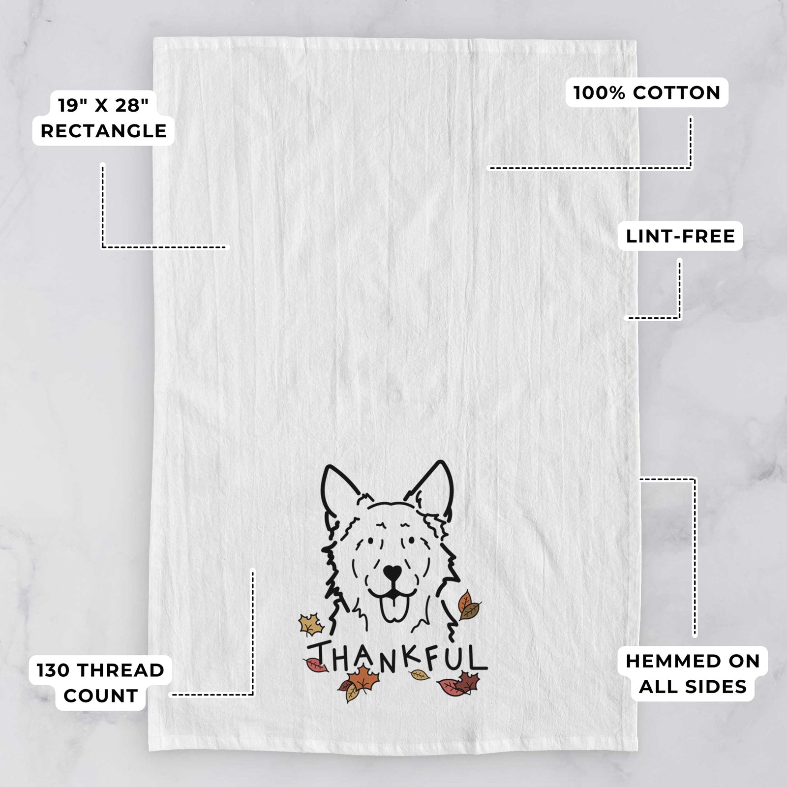 Minimalist line drawing of Jack the Mudi with 'Thankful' lettering on a tea towel, with feature callouts: 19 x 28 inch rectangle, 100% cotton, lint-free, 120 thread count, hemmed on all sides