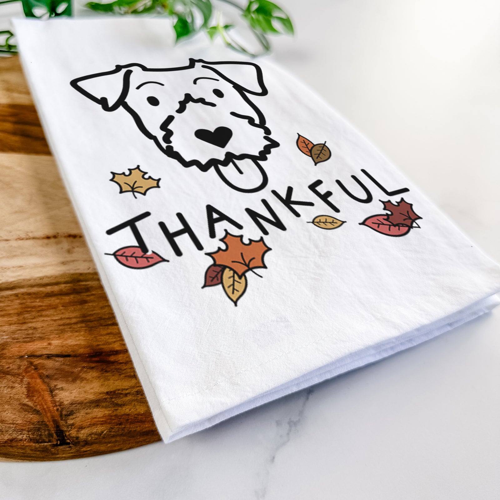 Minimalist line drawing of a Jack Russell Terrier with 'Thankful' lettering on a tea towel