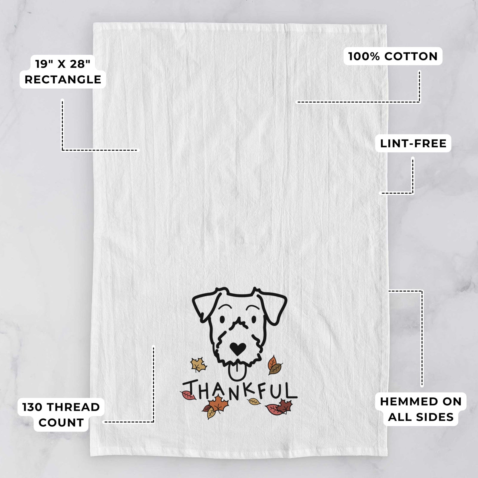 Minimalist line drawing of a Jack Russell Terrier with 'Thankful' lettering on a tea towel, with feature callouts: 19 x 28 inch rectangle, 100% cotton, lint-free, 120 thread count, hemmed on all sides