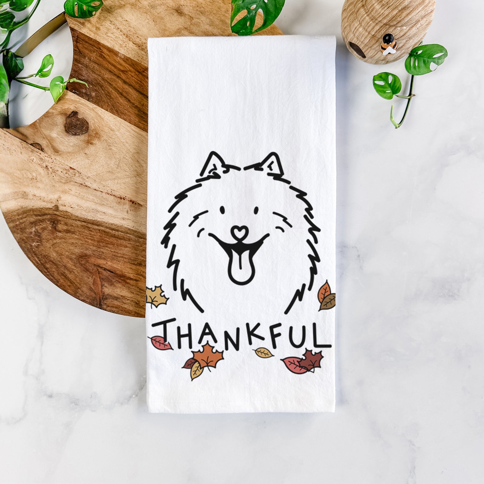Minimalist line drawing of Johnny the Samoyed with 'Thankful' lettering on a tea towel