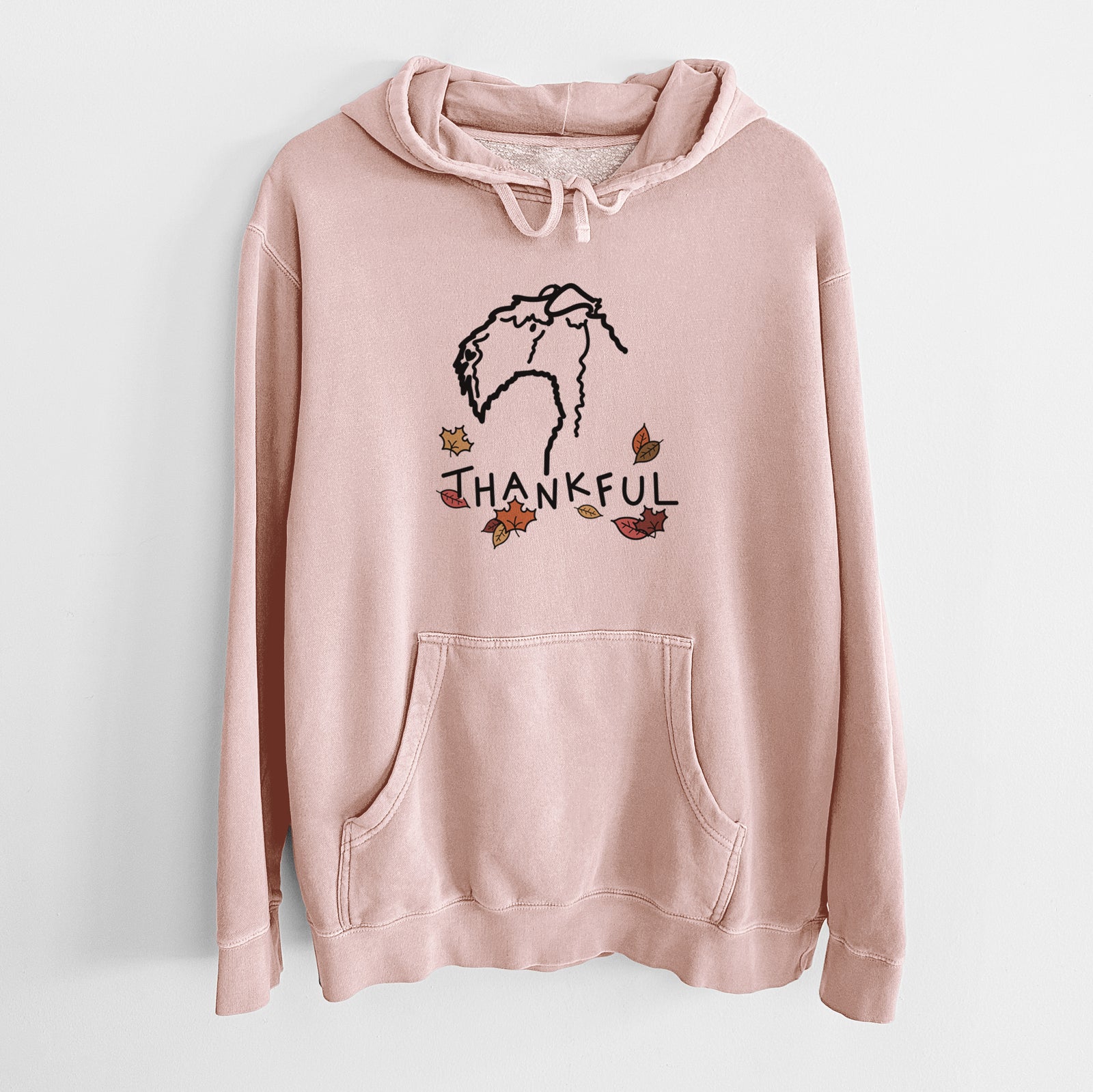 Minimalist line drawing of a Kerry Blue Terrier with 'Thankful' lettering on a Dusty Pink Unisex pigment dyed hoodie