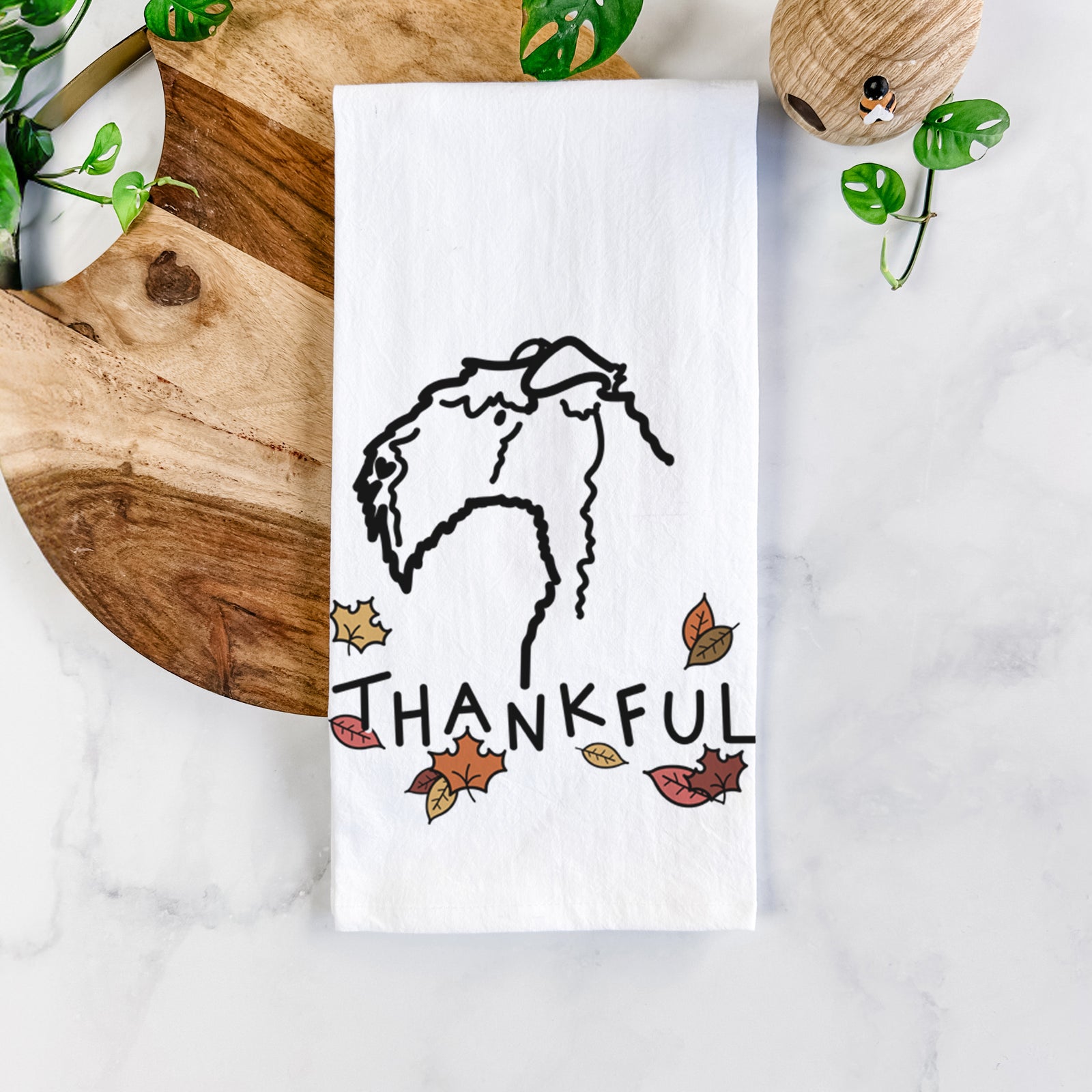 Minimalist line drawing of a Kerry Blue Terrier with 'Thankful' lettering on a tea towel