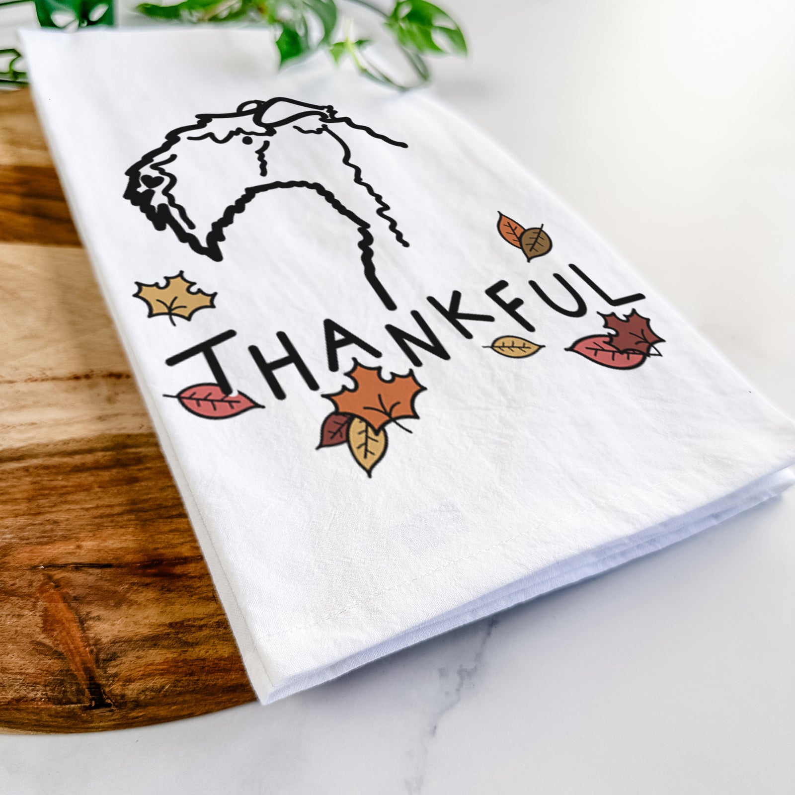 Minimalist line drawing of a Kerry Blue Terrier with 'Thankful' lettering on a tea towel