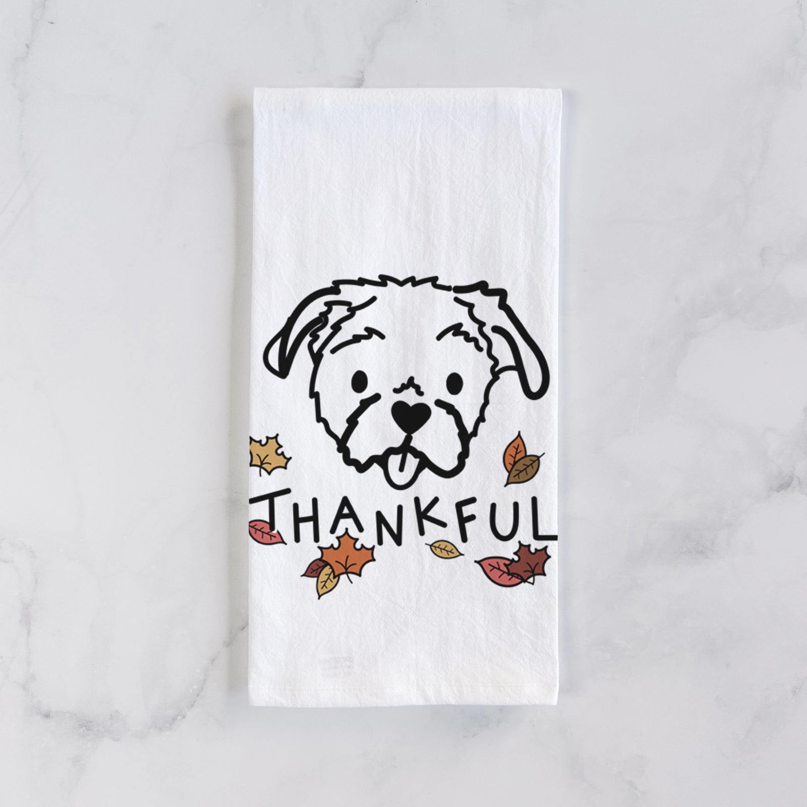 Minimalist line drawing of Koko the Shih Tzu with 'Thankful' lettering on a tea towel