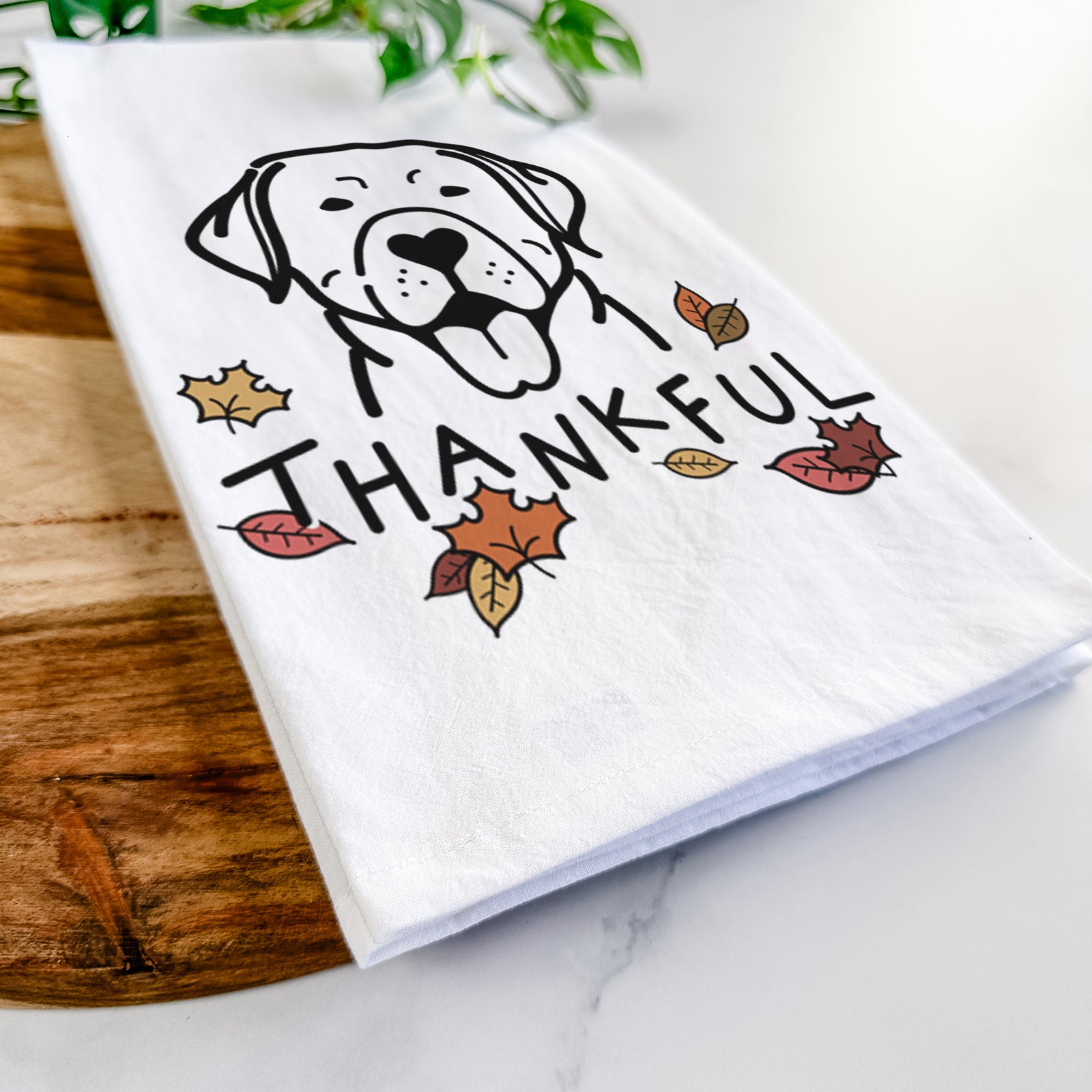Minimalist line drawing of a Labrador Retriever with 'Thankful' lettering on a tea towel
