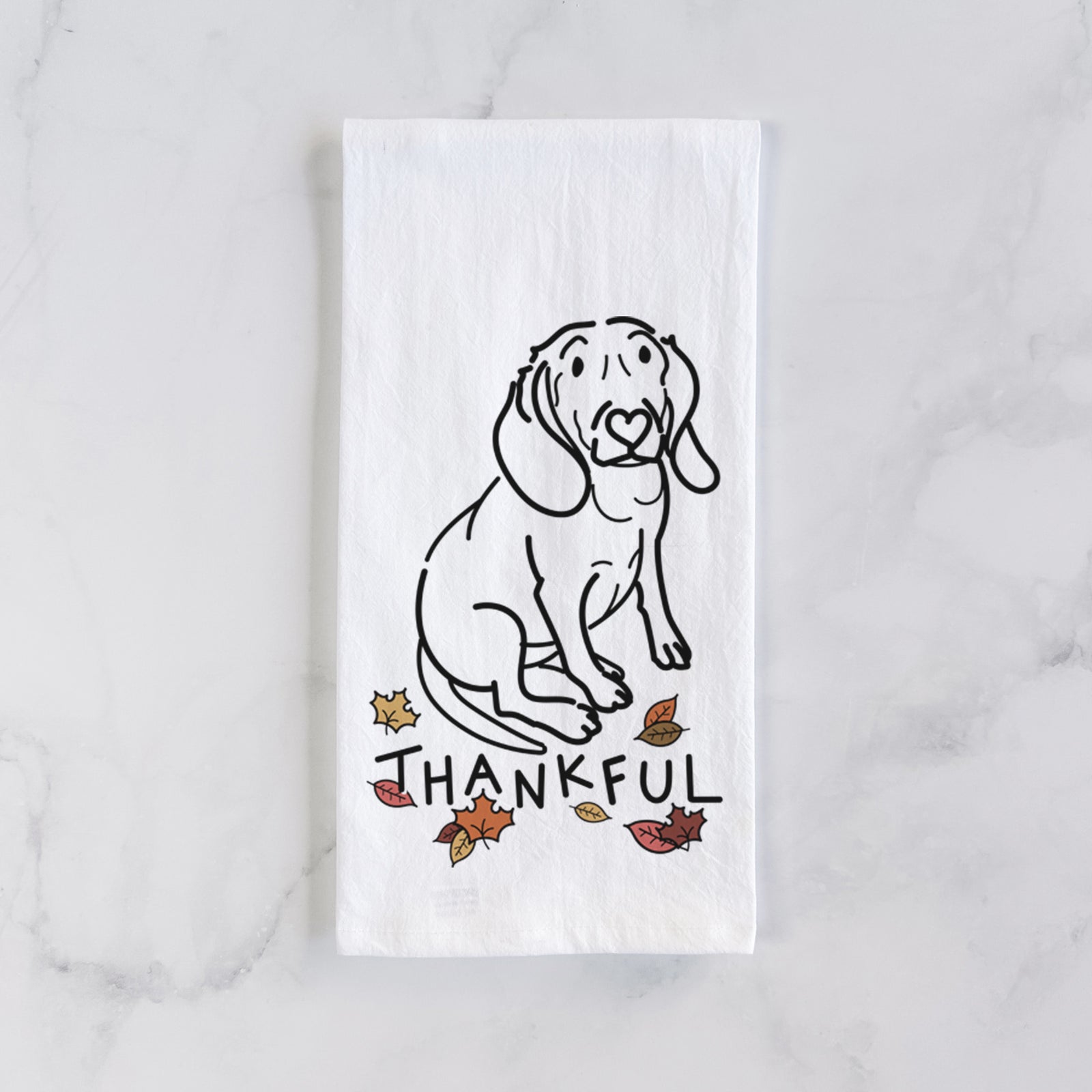 Minimalist line drawing of Lilly the Beagle with 'Thankful' lettering on a tea towel