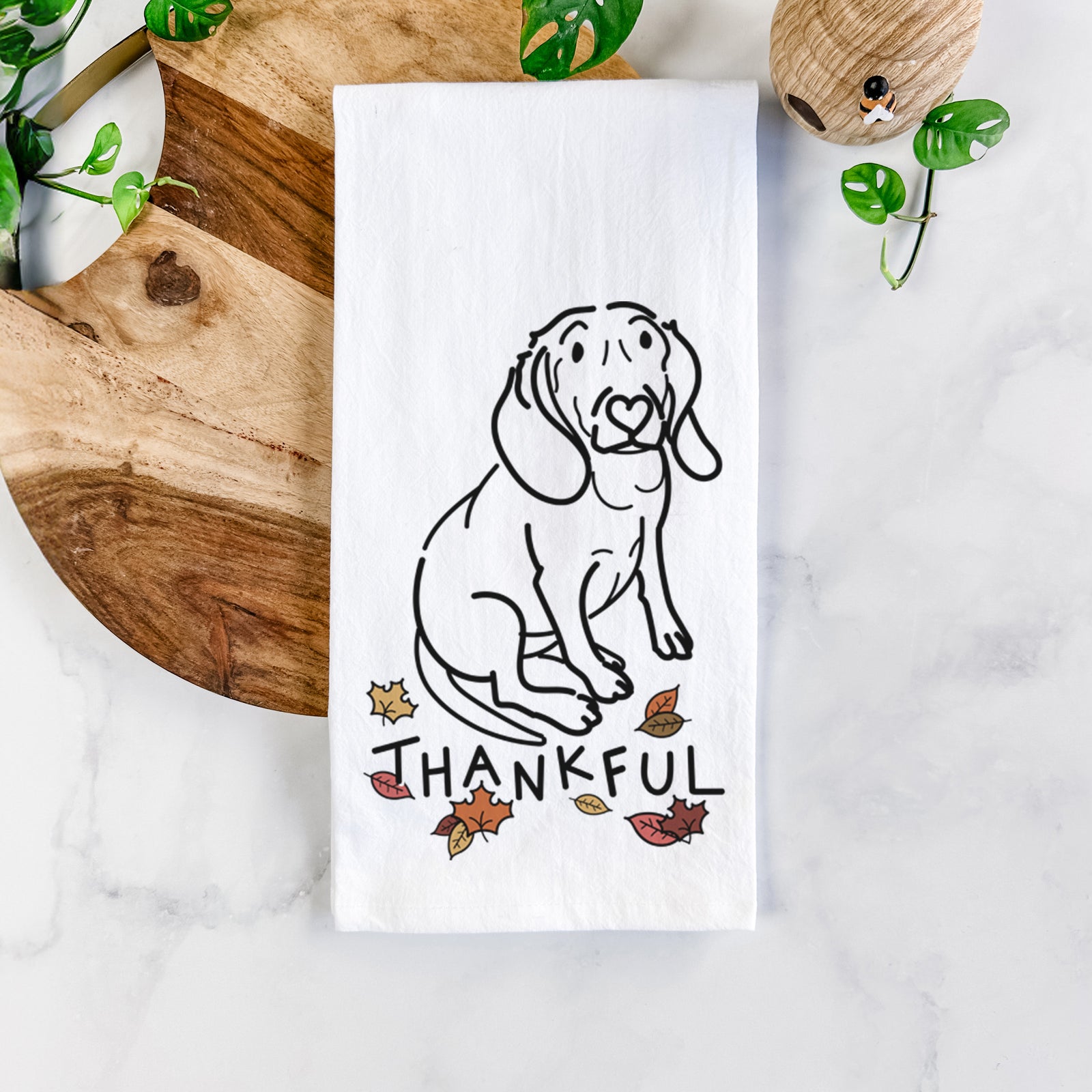 Minimalist line drawing of Lilly the Beagle with 'Thankful' lettering on a tea towel