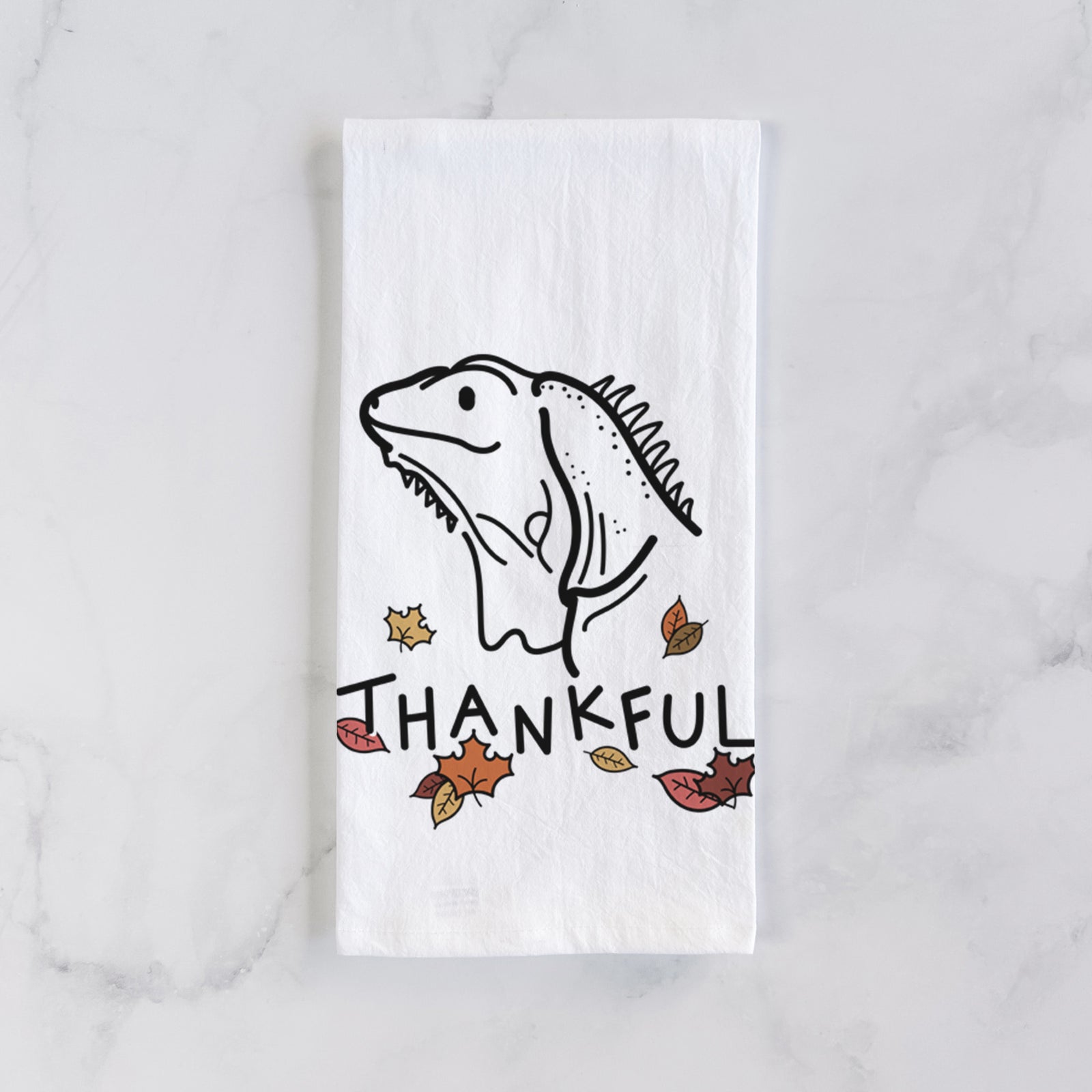 Minimalist line drawing of Louie the Iguana with 'Thankful' lettering on a tea towel