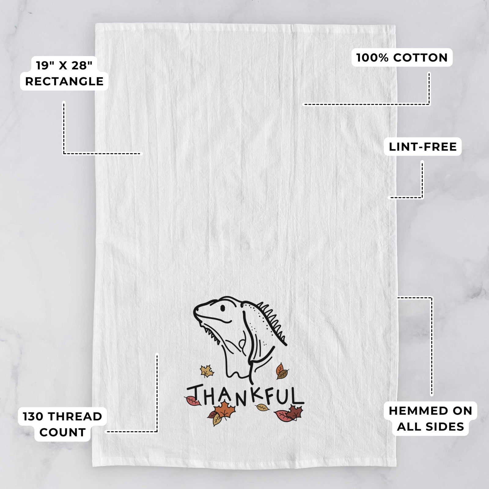 Minimalist line drawing of Louie the Iguana with 'Thankful' lettering on a tea towel, with feature callouts: 19 x 28 inch rectangle, 100% cotton, lint-free, 120 thread count, hemmed on all sides