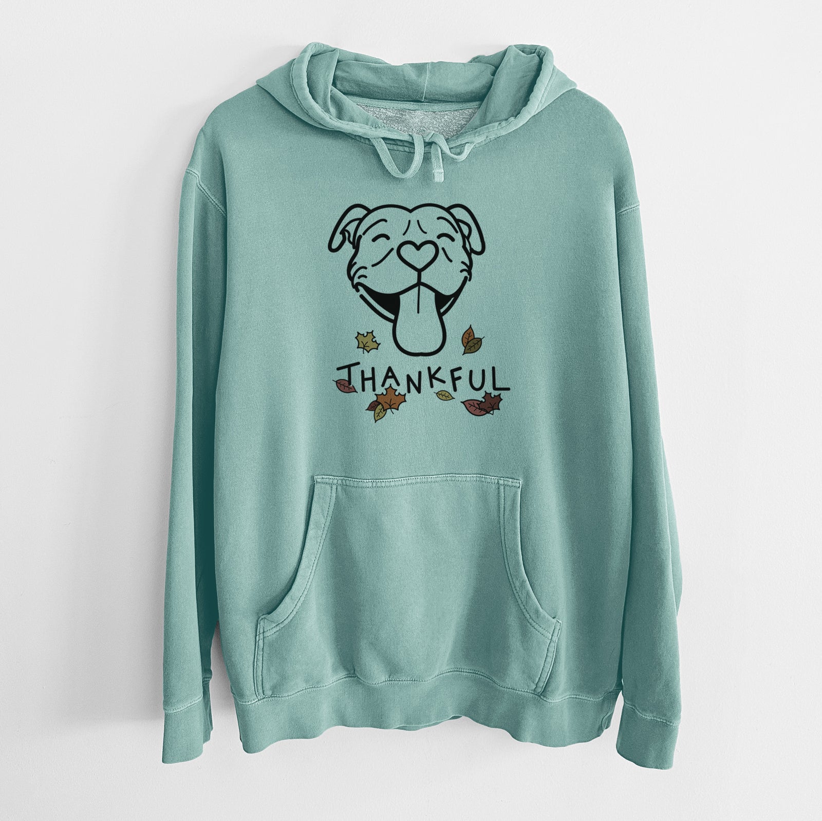 Minimalist line drawing of Louie the Pitbull with 'Thankful' lettering on a Mint Unisex pigment dyed hoodie