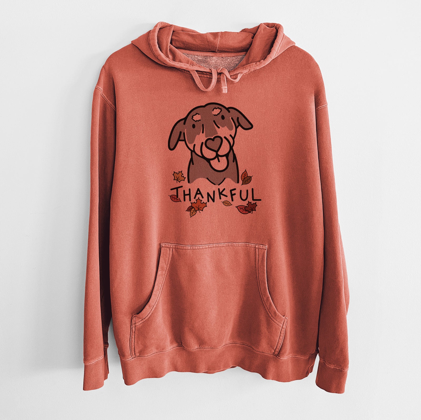 Minimalist line drawing of Lousia the Mixed Breed with 'Thankful' lettering on an Amber Unisex pigment dyed hoodie