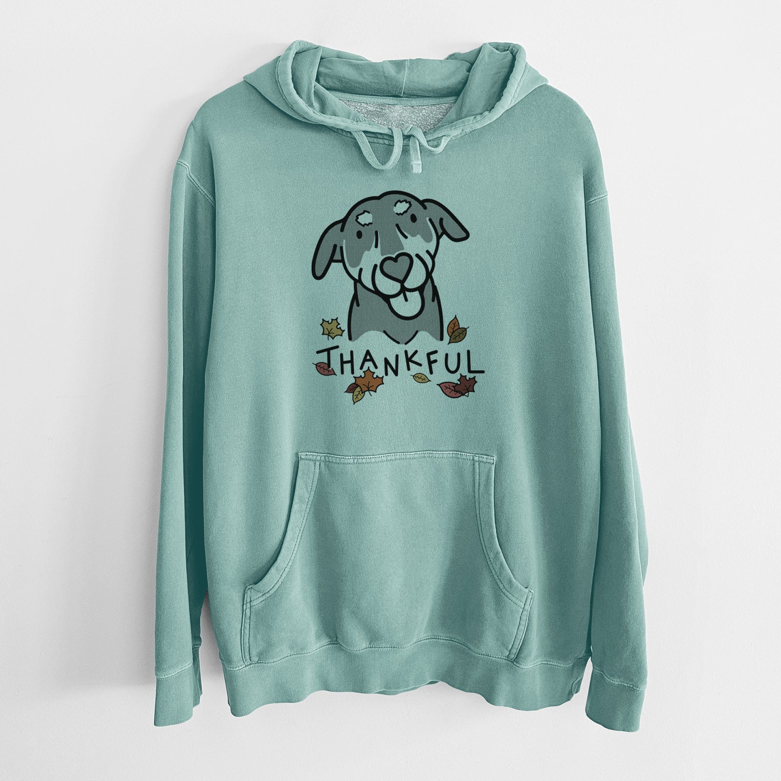 Minimalist line drawing of Lousia the Mixed Breed with 'Thankful' lettering on a Mint Unisex pigment dyed hoodie