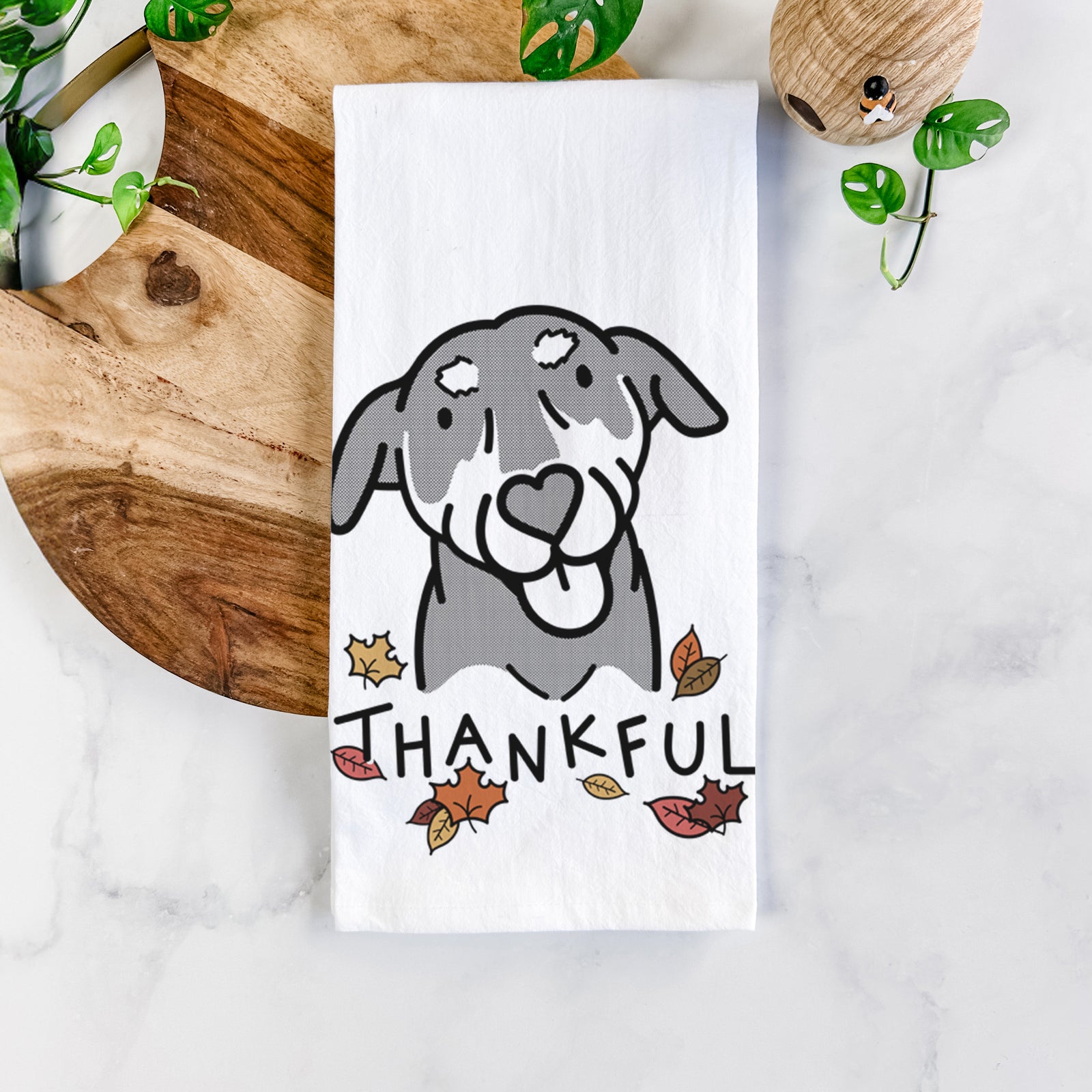 Minimalist line drawing of Lousia the Mixed Breed with 'Thankful' lettering on a tea towel