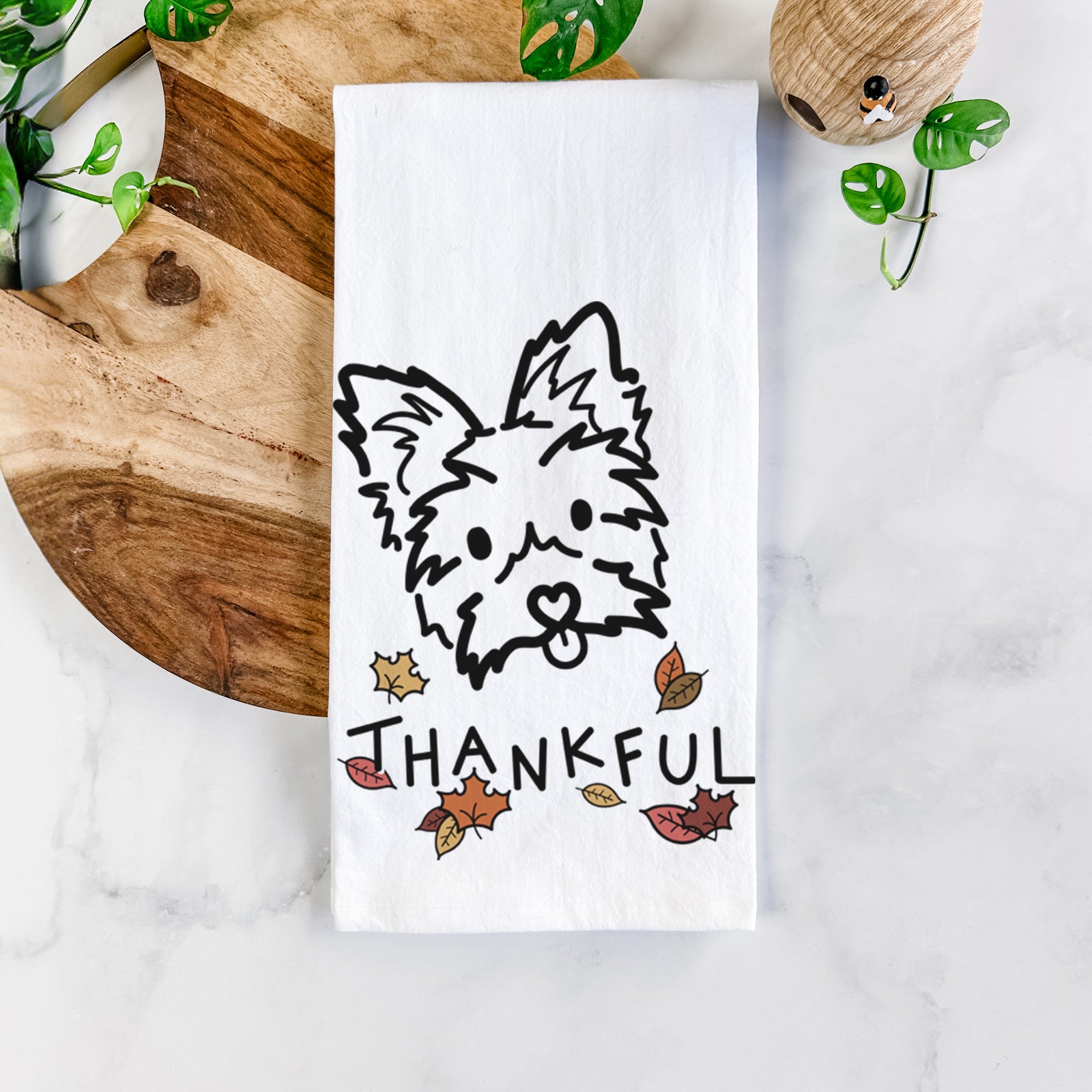 Minimalist line drawing of Luna the Yorkshire Terrier with 'Thankful' lettering on a tea towel