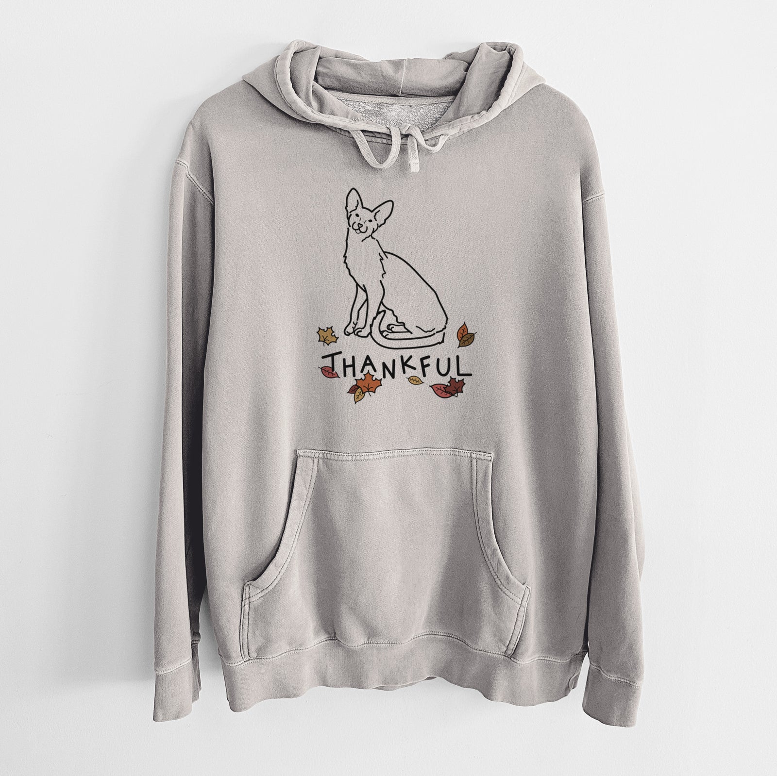 Minimalist line drawing of Lyra the Oriental Shorthair Cat with 'Thankful' lettering on a Cement Unisex pigment dyed hoodie