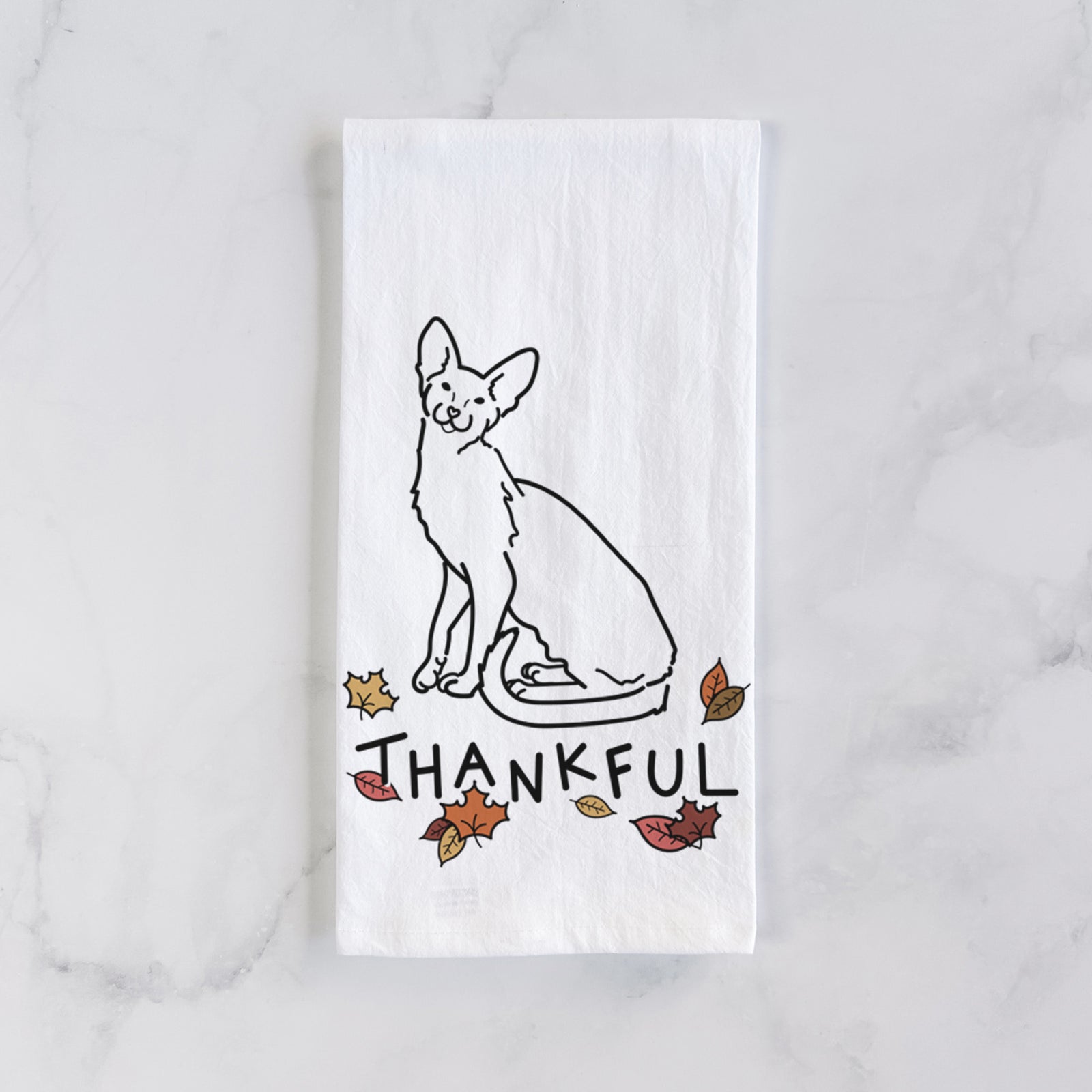 Minimalist line drawing of Lyra the Oriental Shorthair Cat with 'Thankful' lettering on a tea towel