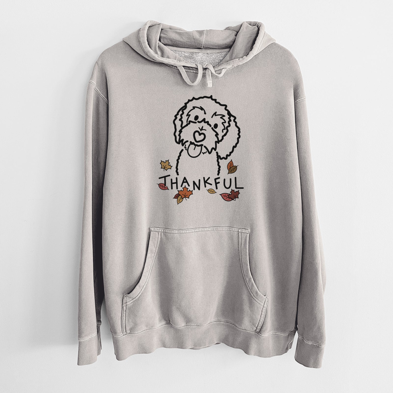 Minimalist line drawing of Mabel the Bernedoodle with 'Thankful' lettering on a Cement Unisex pigment dyed hoodie