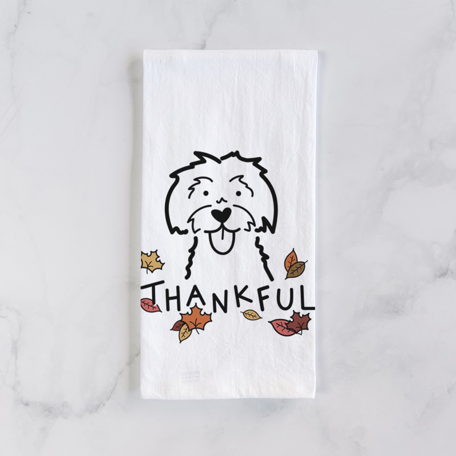 Minimalist line drawing of a Maltese with 'Thankful' lettering on a tea towel