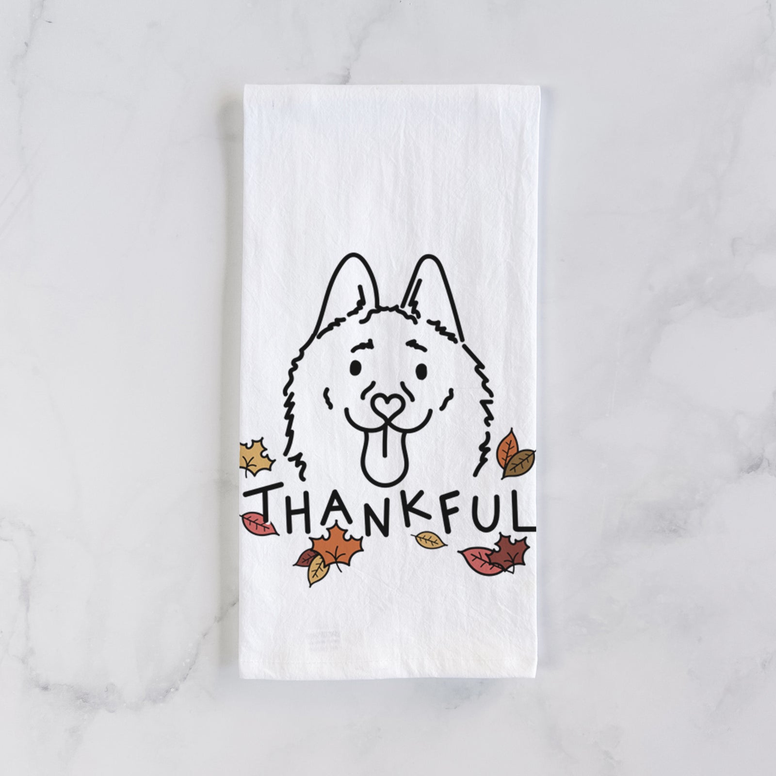 Minimalist line drawing of Meeko the Schipperke with 'Thankful' lettering on a tea towel