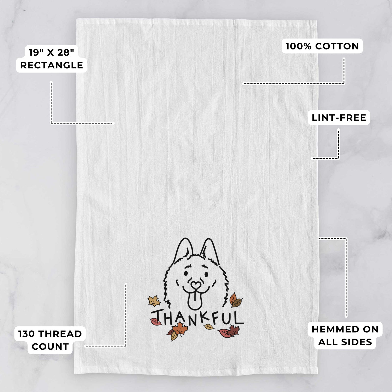 Minimalist line drawing of Meeko the Schipperke with 'Thankful' lettering on a tea towel, with feature callouts: 19 x 28 inch rectangle, 100% cotton, lint-free, 120 thread count, hemmed on all sides