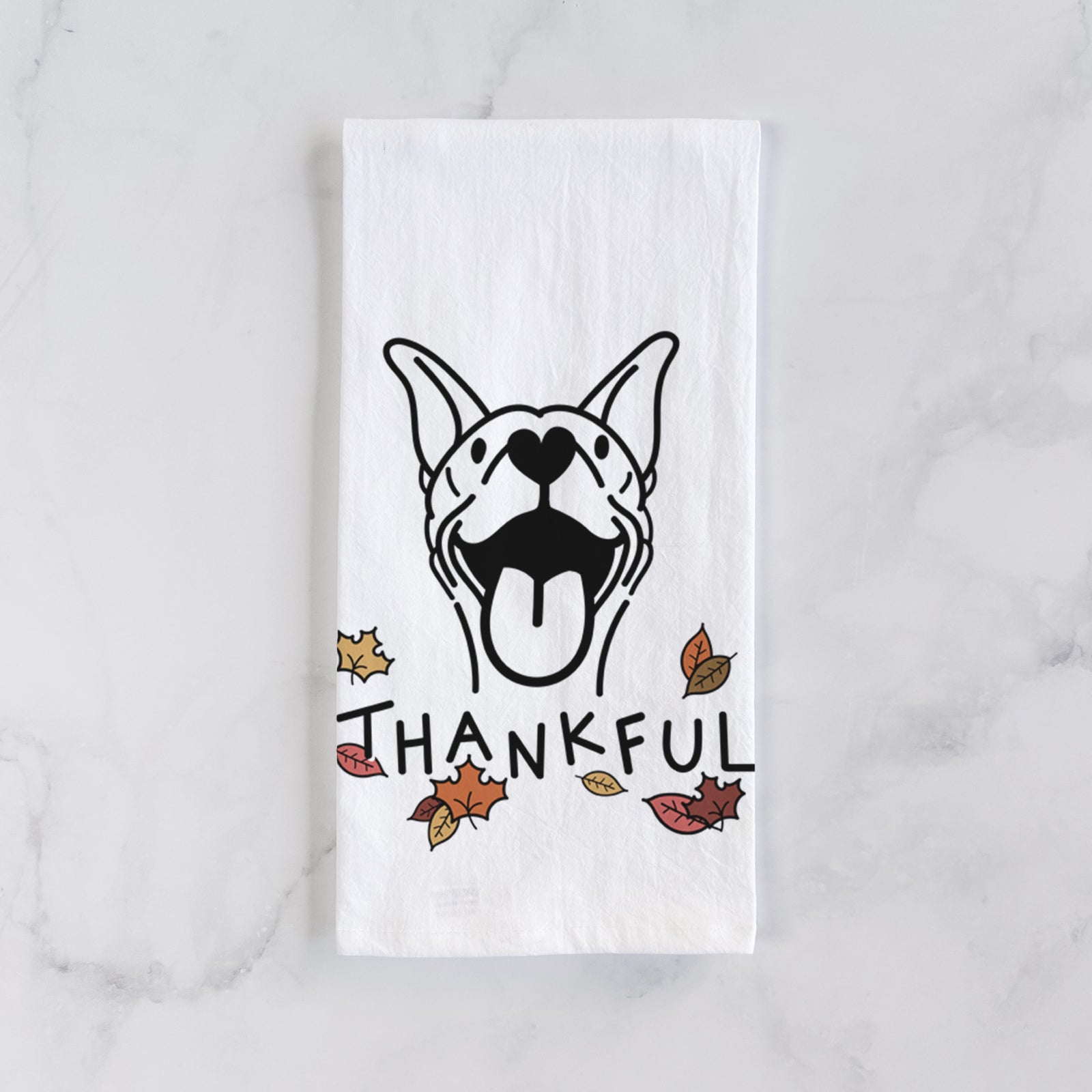 Minimalist line drawing of Merlin the Basenji with 'Thankful' lettering on a tea towel