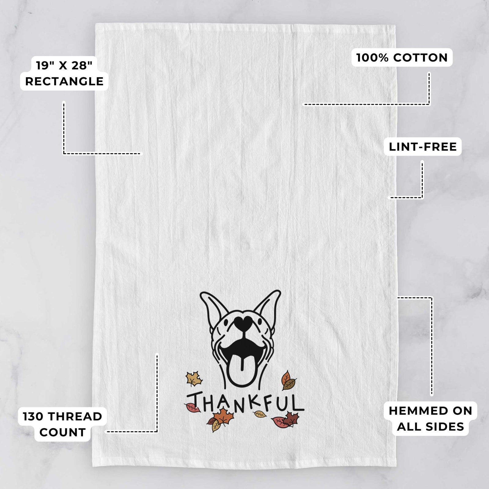 Minimalist line drawing of Merlin the Basenji with 'Thankful' lettering on a tea towel, with feature callouts: 19 x 28 inch rectangle, 100% cotton, lint-free, 120 thread count, hemmed on all sides