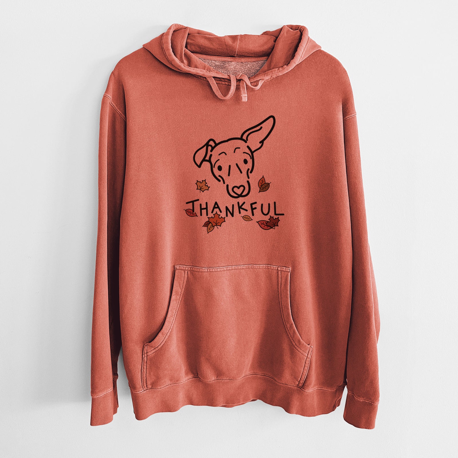 Minimalist line drawing of Millie the Mixed Breed with 'Thankful' lettering on an Amber Unisex pigment dyed hoodie