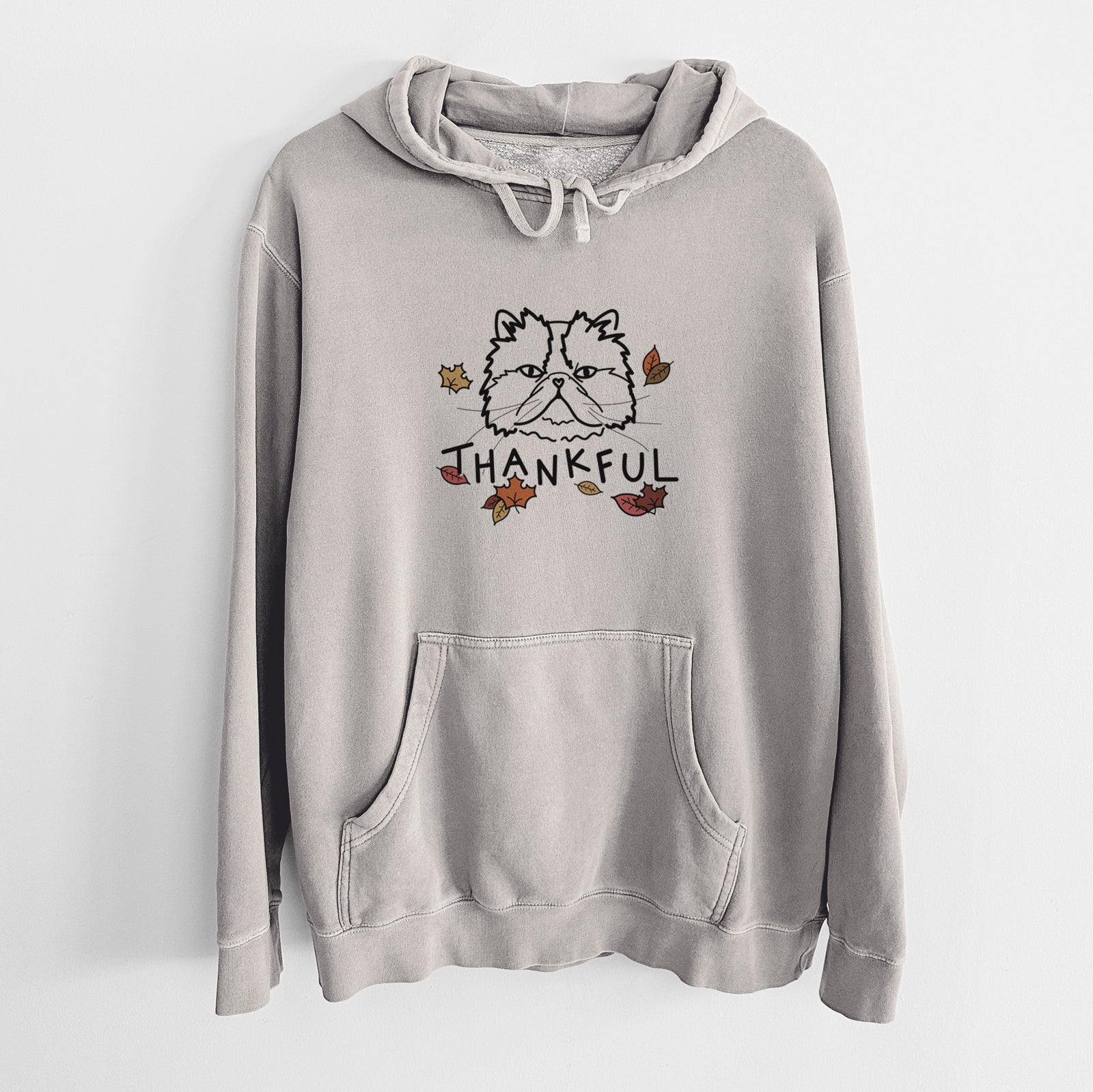 Minimalist line drawing of Mila the Persian Cat with 'Thankful' lettering on a Cement Unisex pigment dyed hoodie