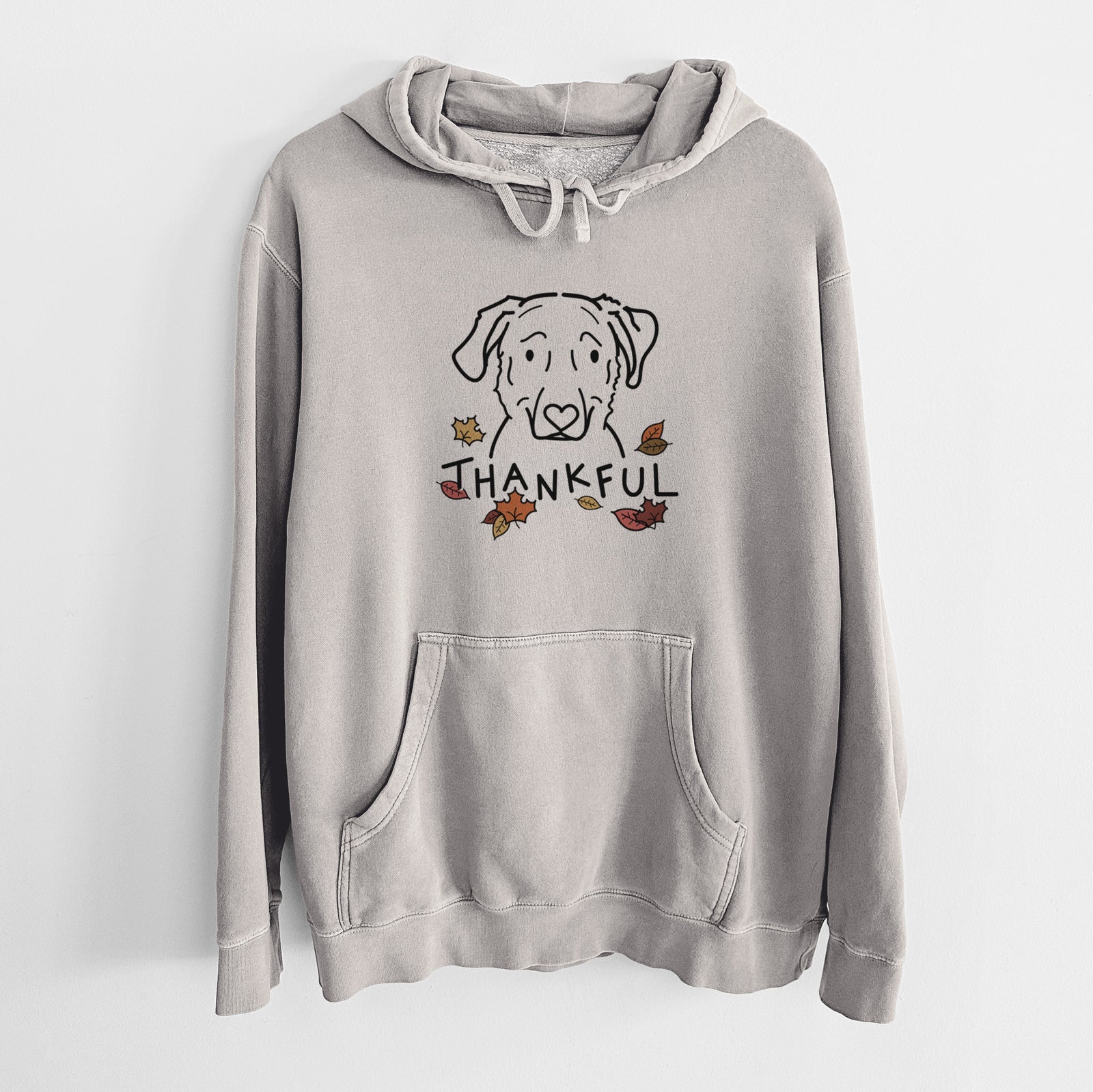 Minimalist line drawing of Mitzi the Golden Retriever Mix with 'Thankful' lettering on a Cement Unisex pigment dyed hoodie