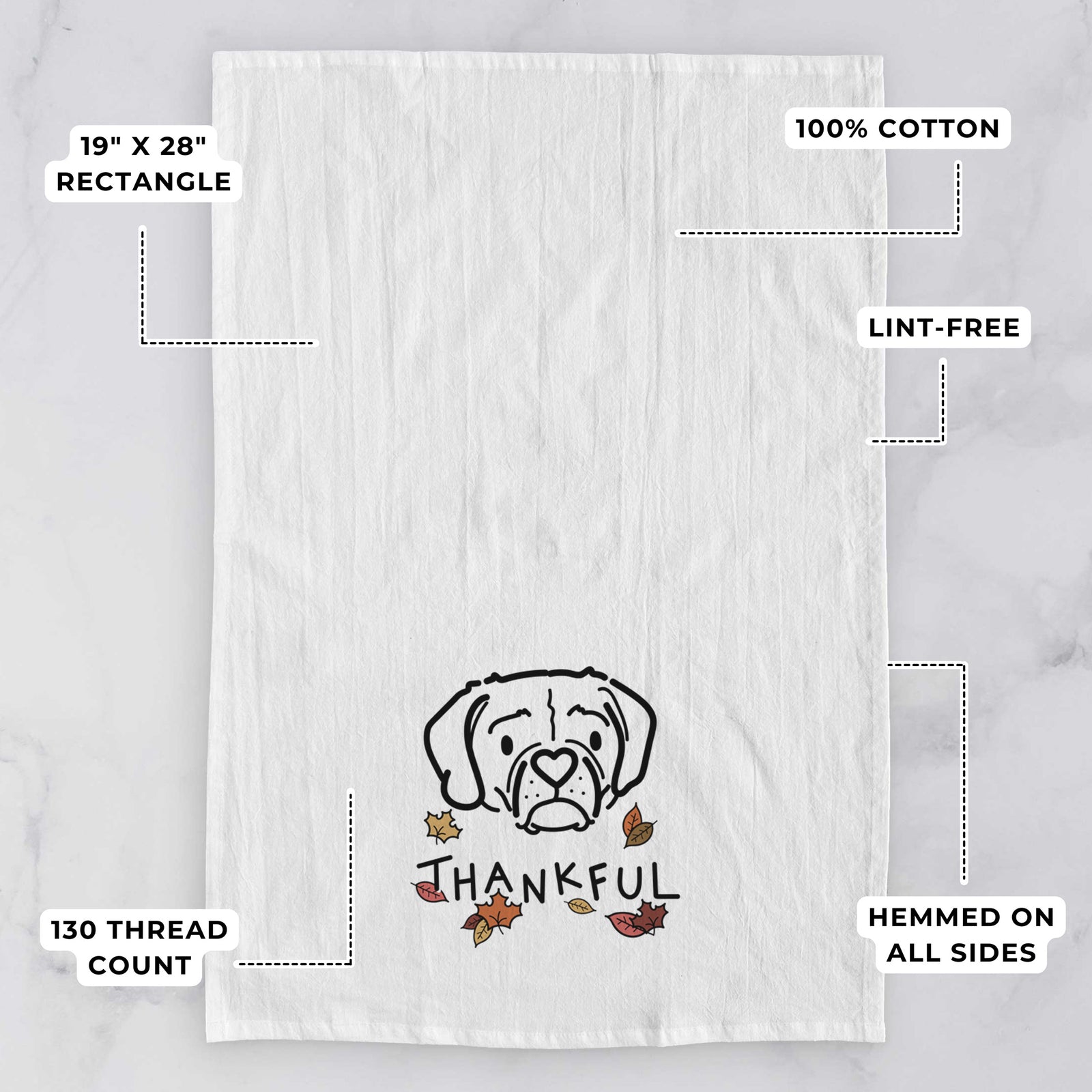 Minimalist line drawing of Mitzi the Puggle with 'Thankful' lettering on a tea towel, with feature callouts: 19 x 28 inch rectangle, 100% cotton, lint-free, 120 thread count, hemmed on all sides