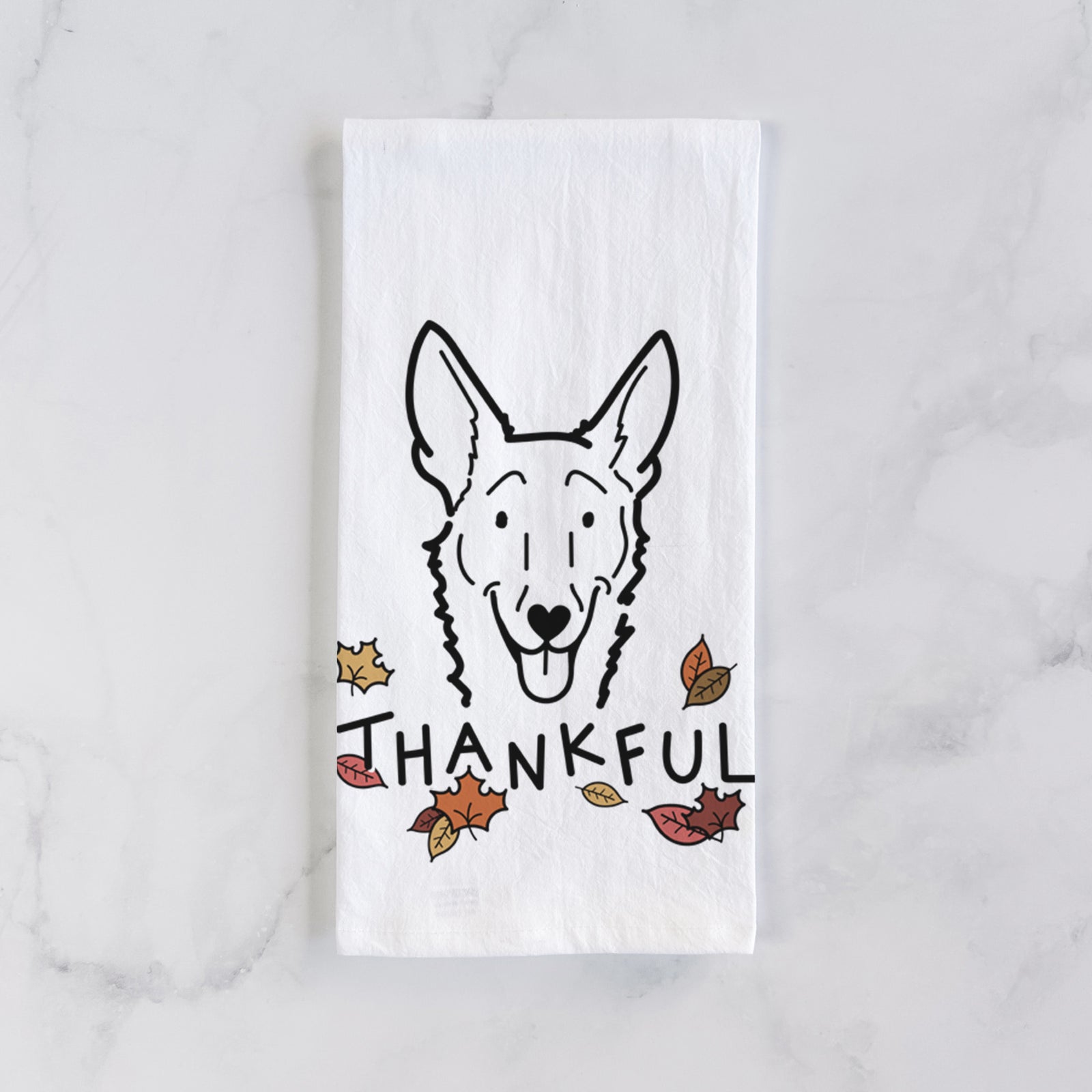 Minimalist line drawing of Mochi the Carolina Dog with 'Thankful' lettering on a tea towel