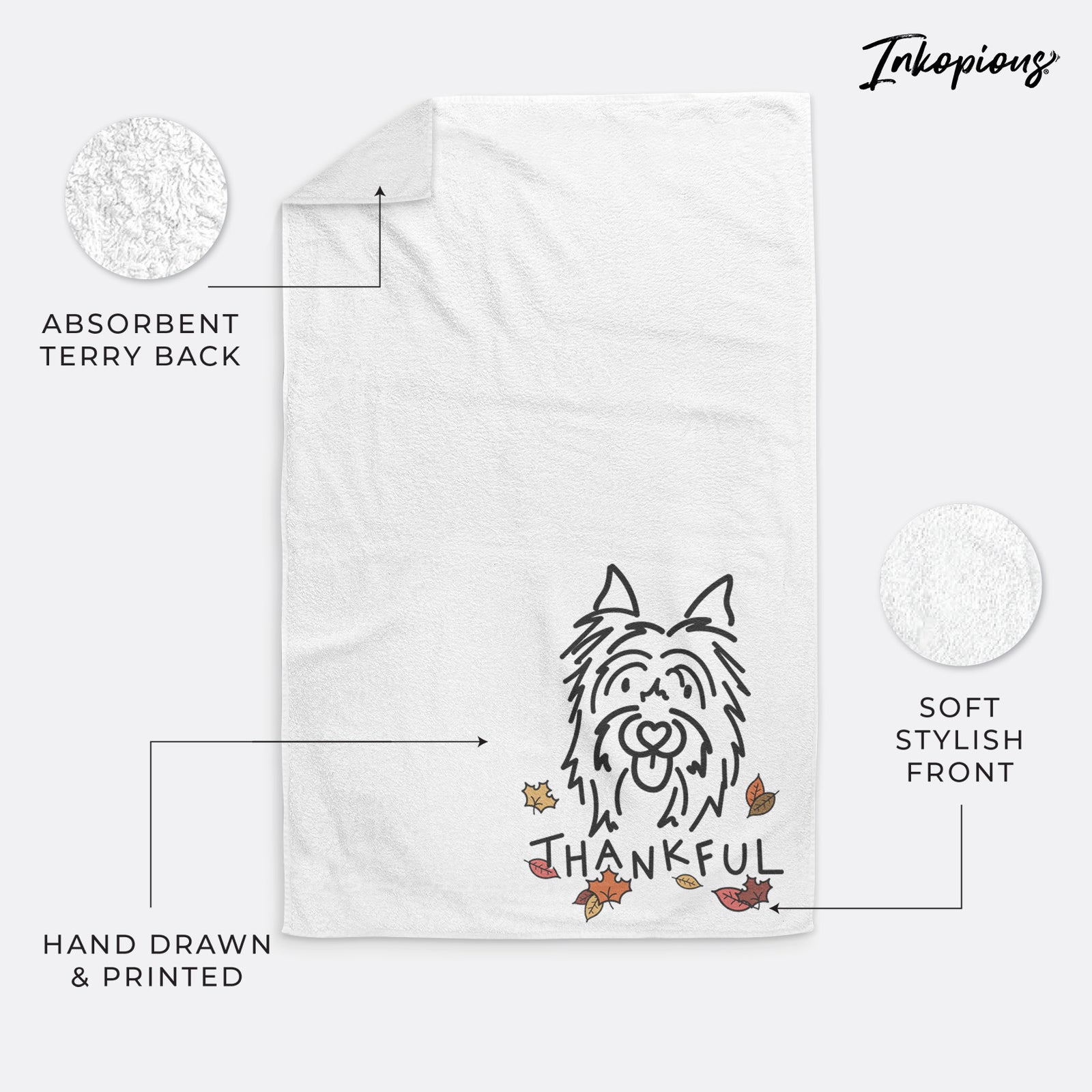 Minimalist line drawing of Monty the Silky Terrier with 'Thankful' lettering on a hand towel