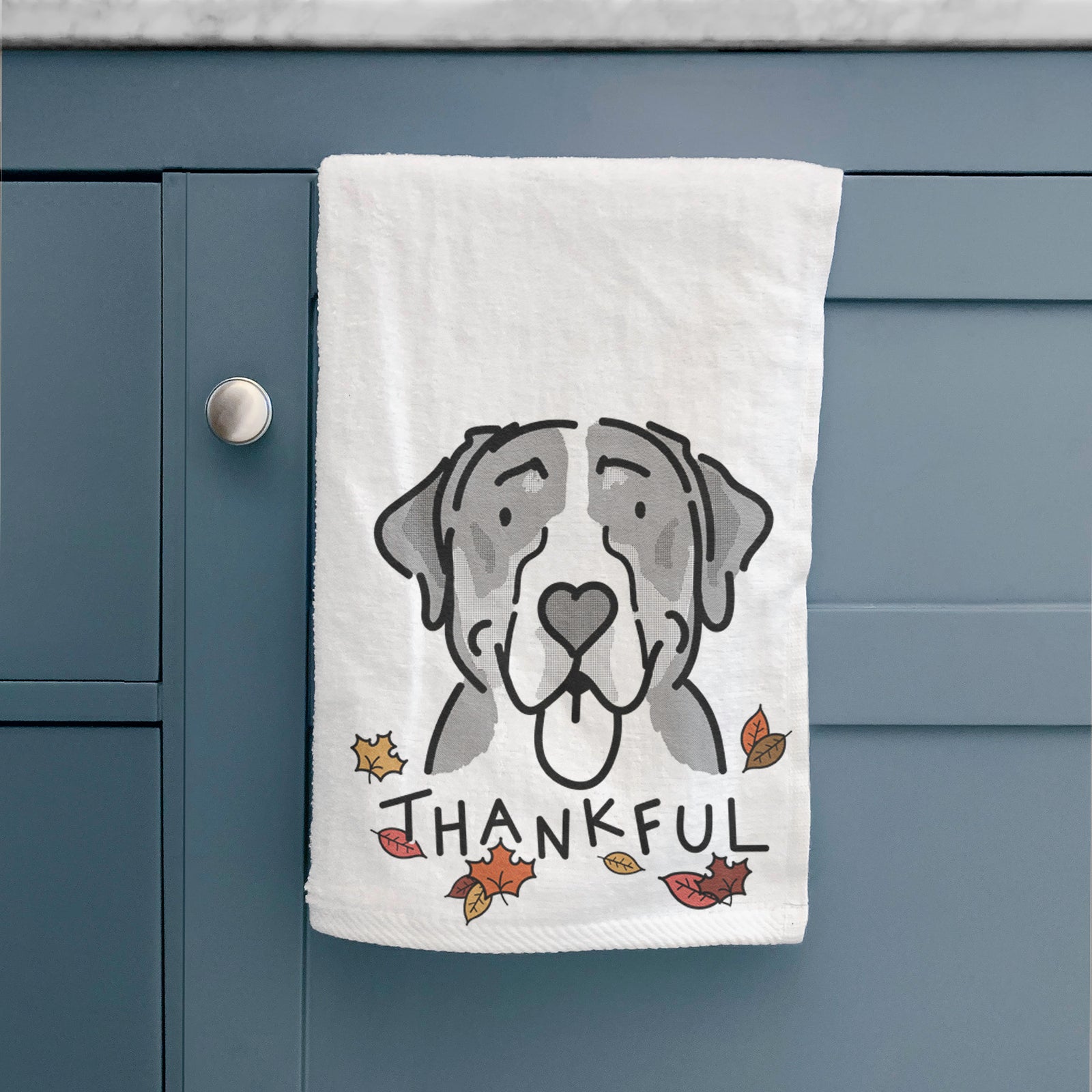 Minimalist line drawing of Moose the Greater Swiss Mountain Dog with 'Thankful' lettering on a hand towel
