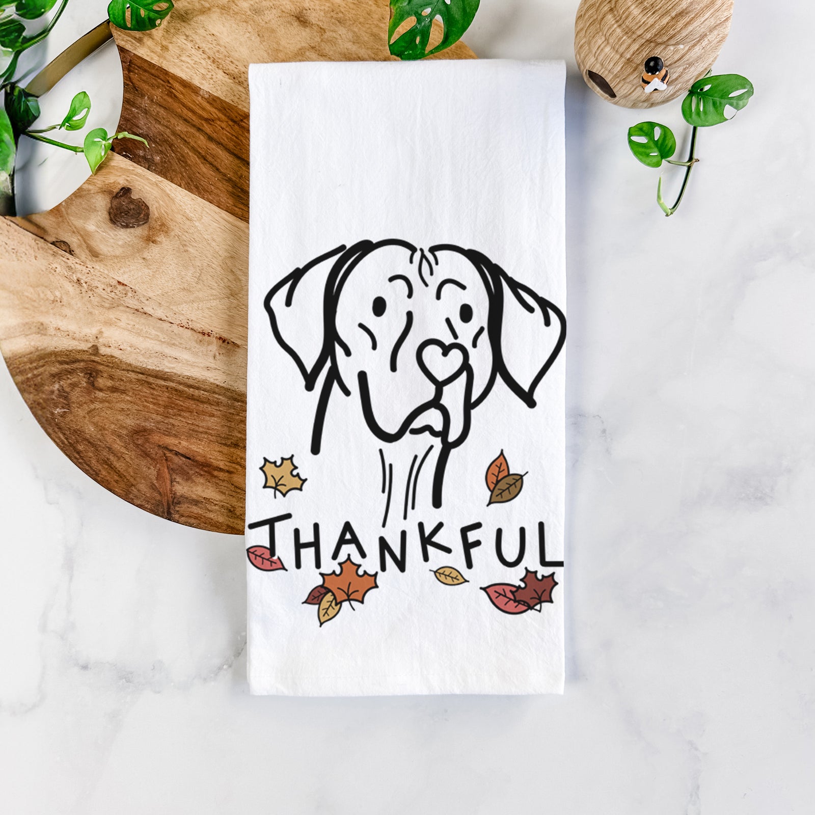 Minimalist line drawing of Moose the Vizsla with 'Thankful' lettering on a tea towel