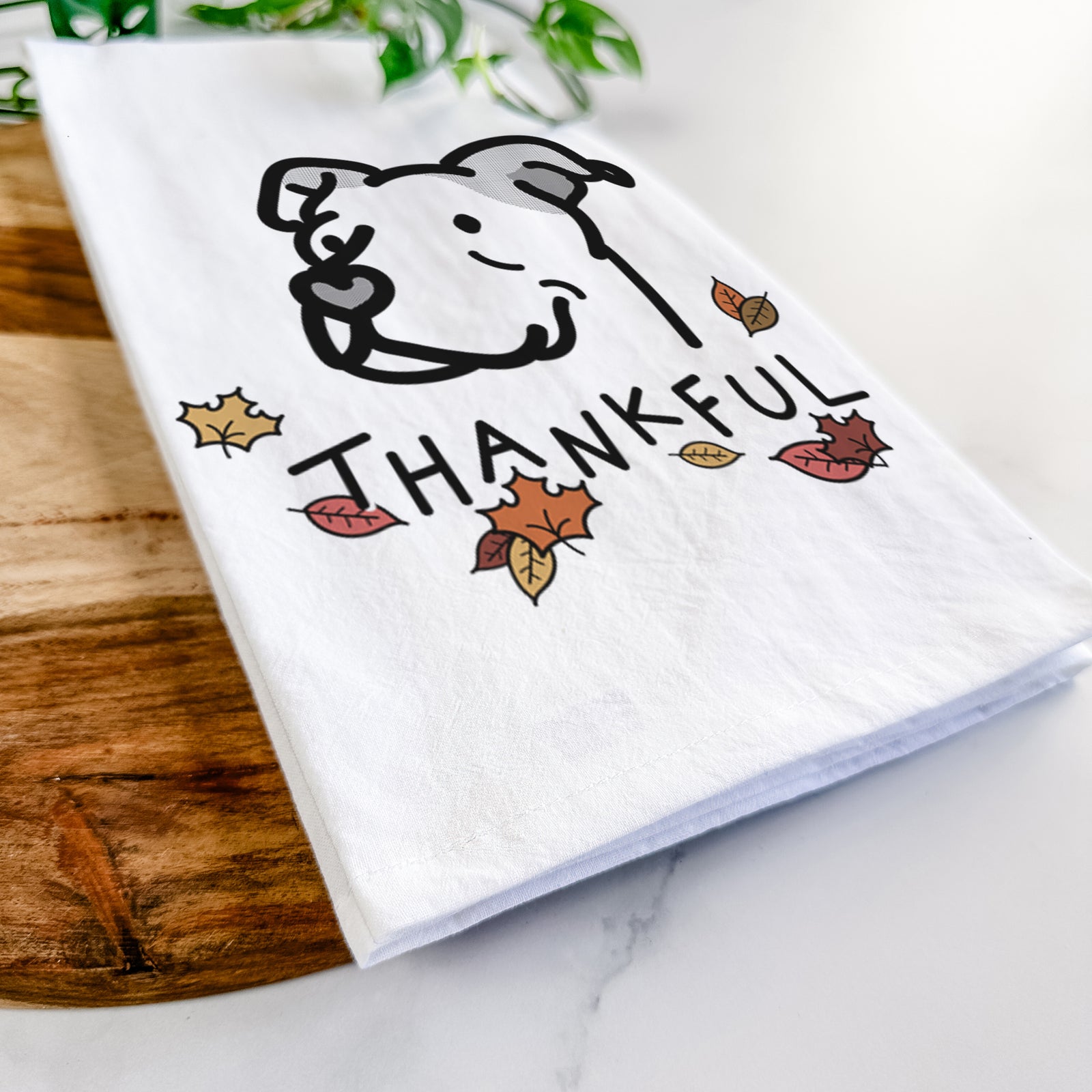 Minimalist line drawing of Mr. Sir the Pitbull Mix with 'Thankful' lettering on a tea towel