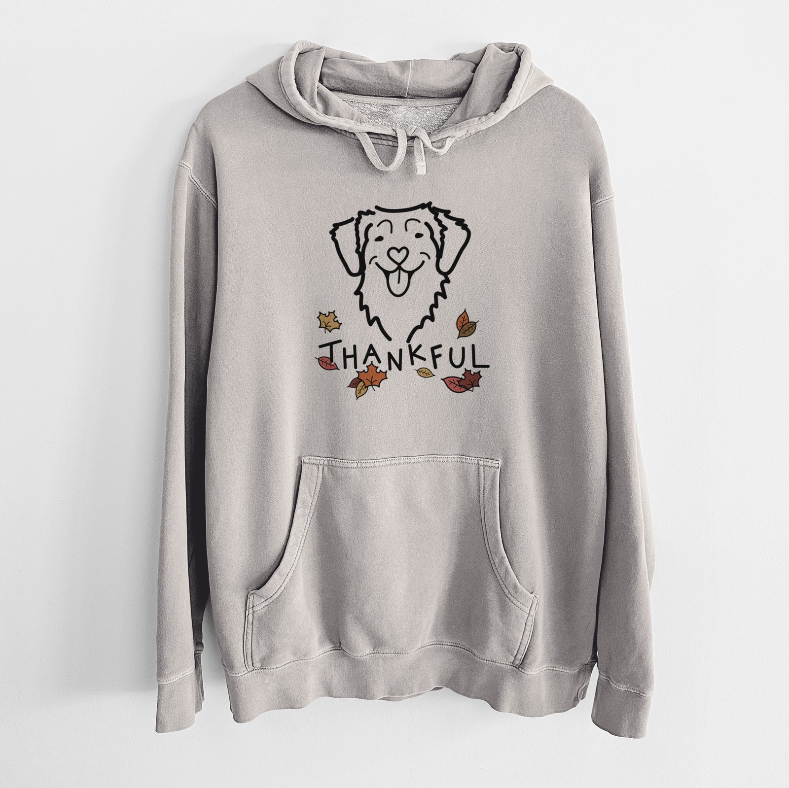 Minimalist line drawing of a Nova Scotia Duck Tolling Retriever with 'Thankful' lettering on a Cement Unisex pigment dyed hoodie