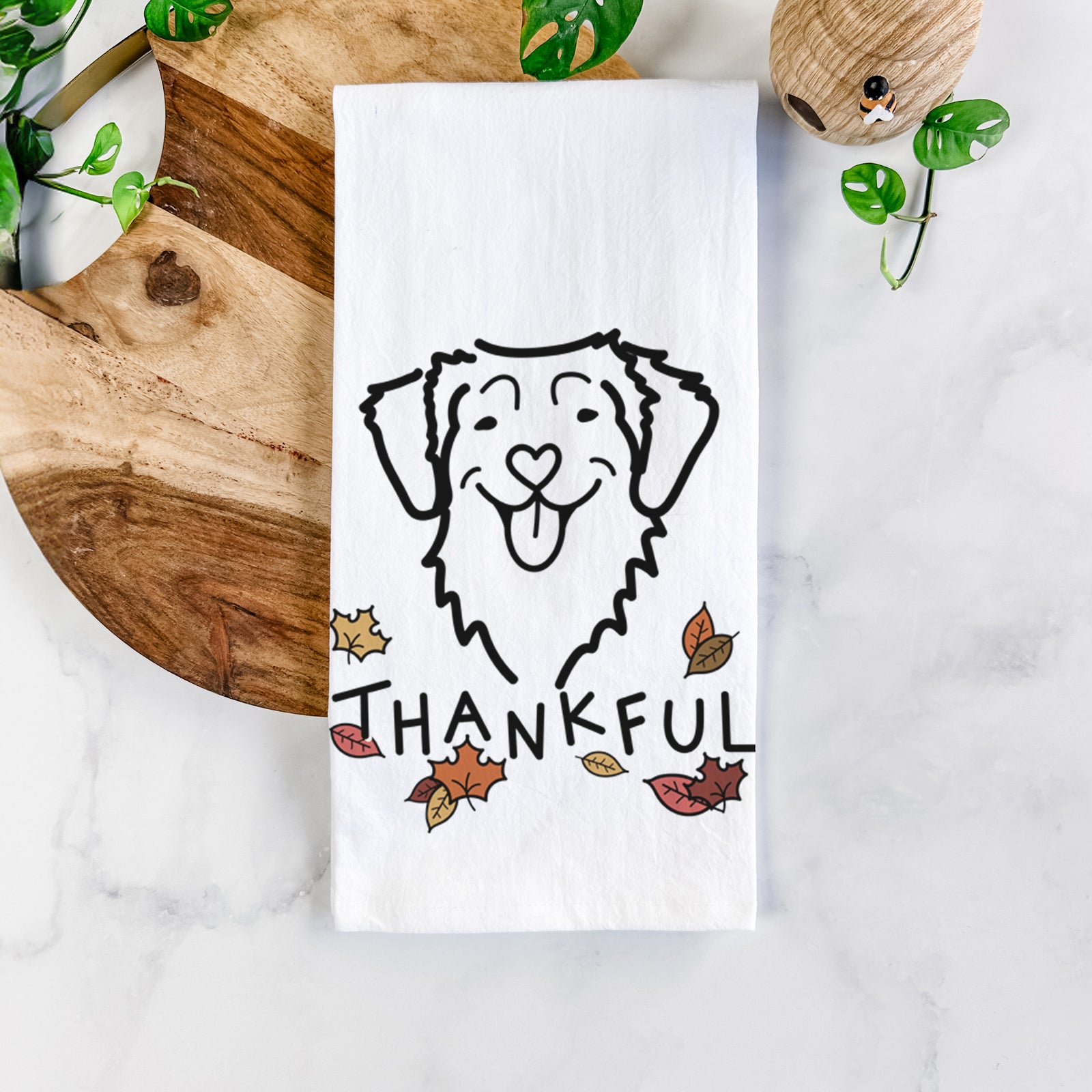 Minimalist line drawing of a Nova Scotia Duck Tolling Retriever with 'Thankful' lettering on a tea towel