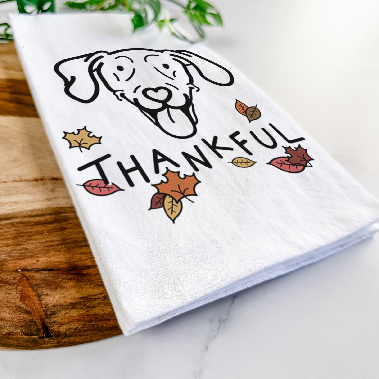 Minimalist line drawing of Paco Lobo the Weimaraner with 'Thankful' lettering on a tea towel