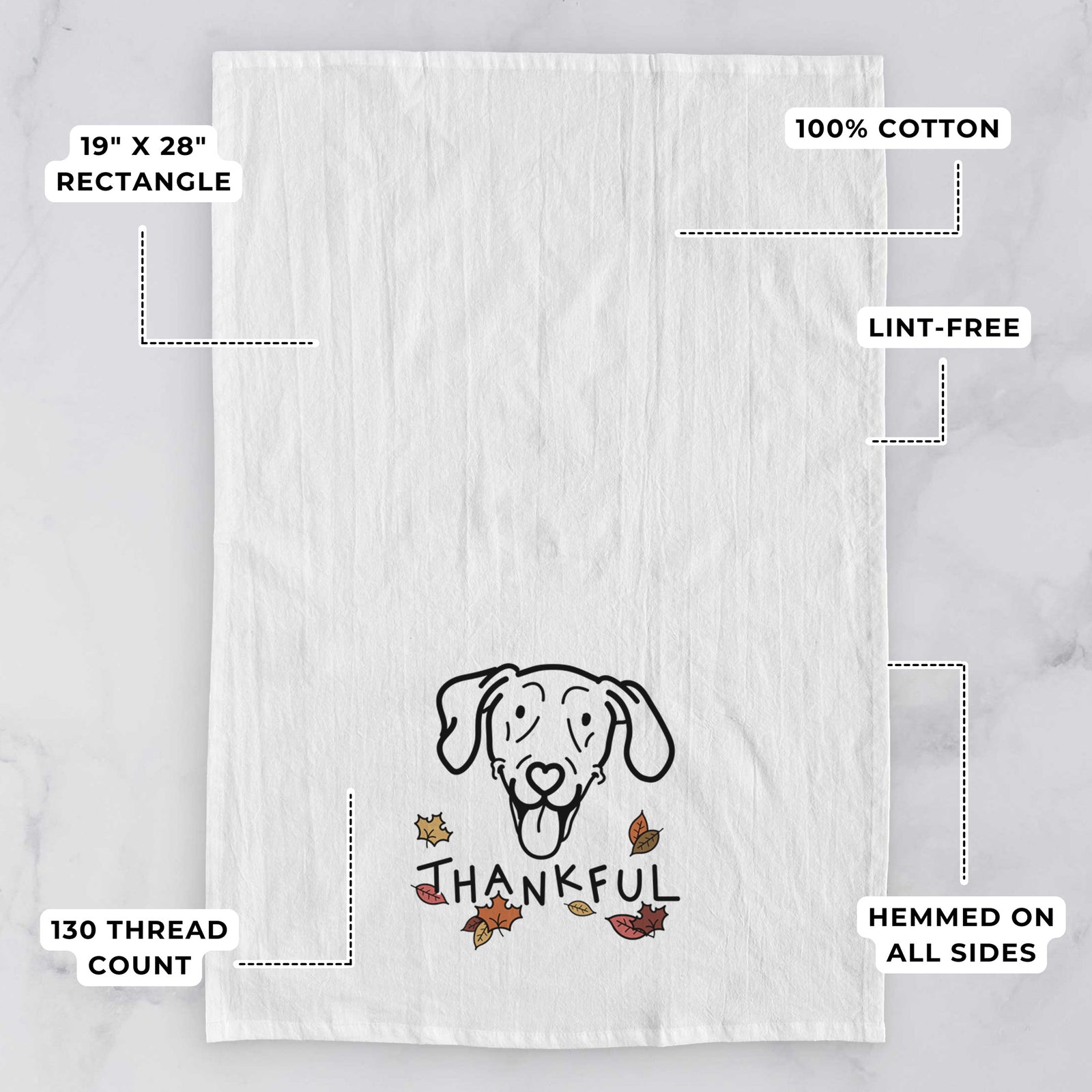 Minimalist line drawing of Paco Lobo the Weimaraner with 'Thankful' lettering on a tea towel, with feature callouts: 19 x 28 inch rectangle, 100% cotton, lint-free, 120 thread count, hemmed on all sides